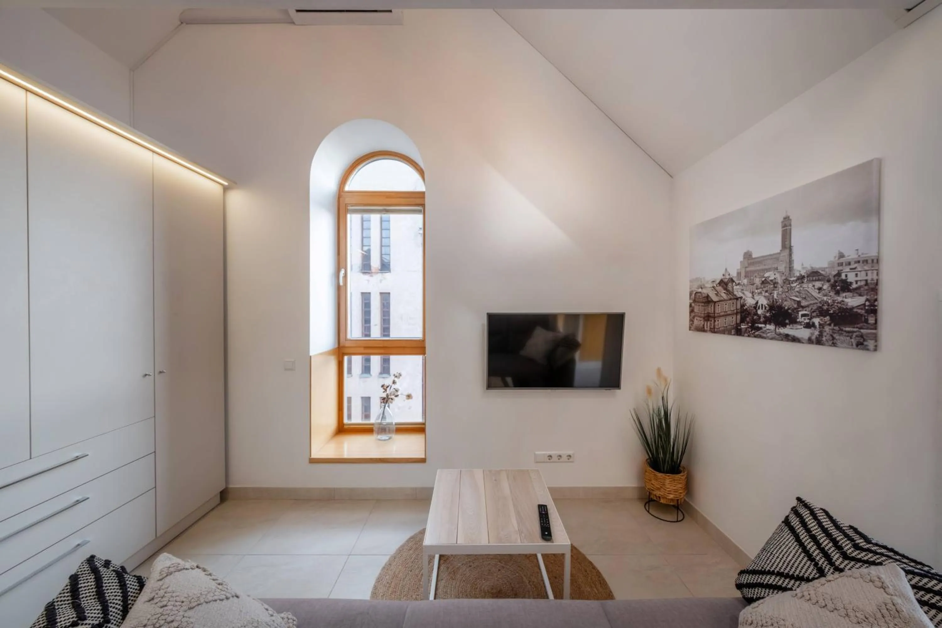 Communal lounge/ TV room in King Mindaugas Apartments