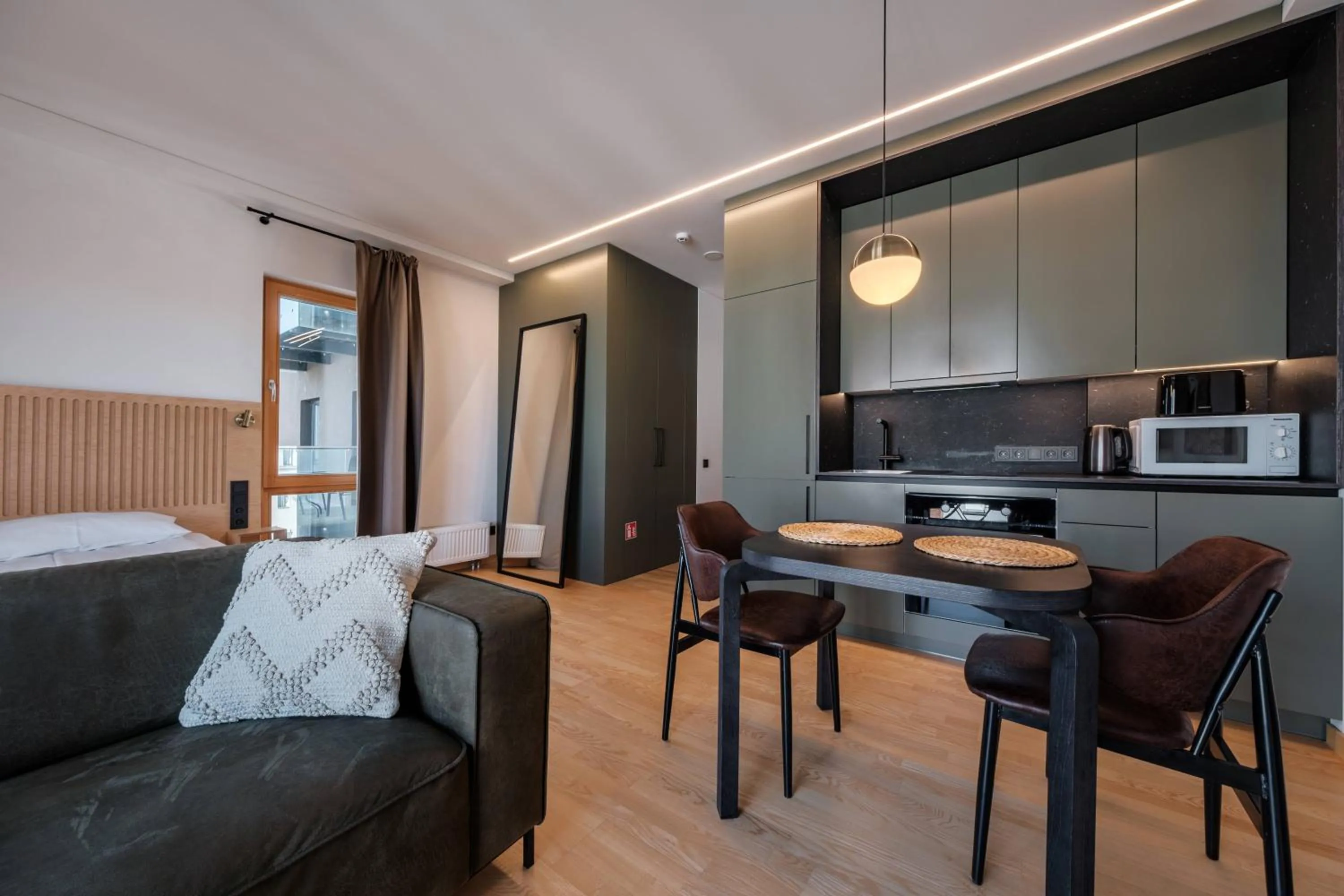 Kitchen or kitchenette in King Mindaugas Apartments