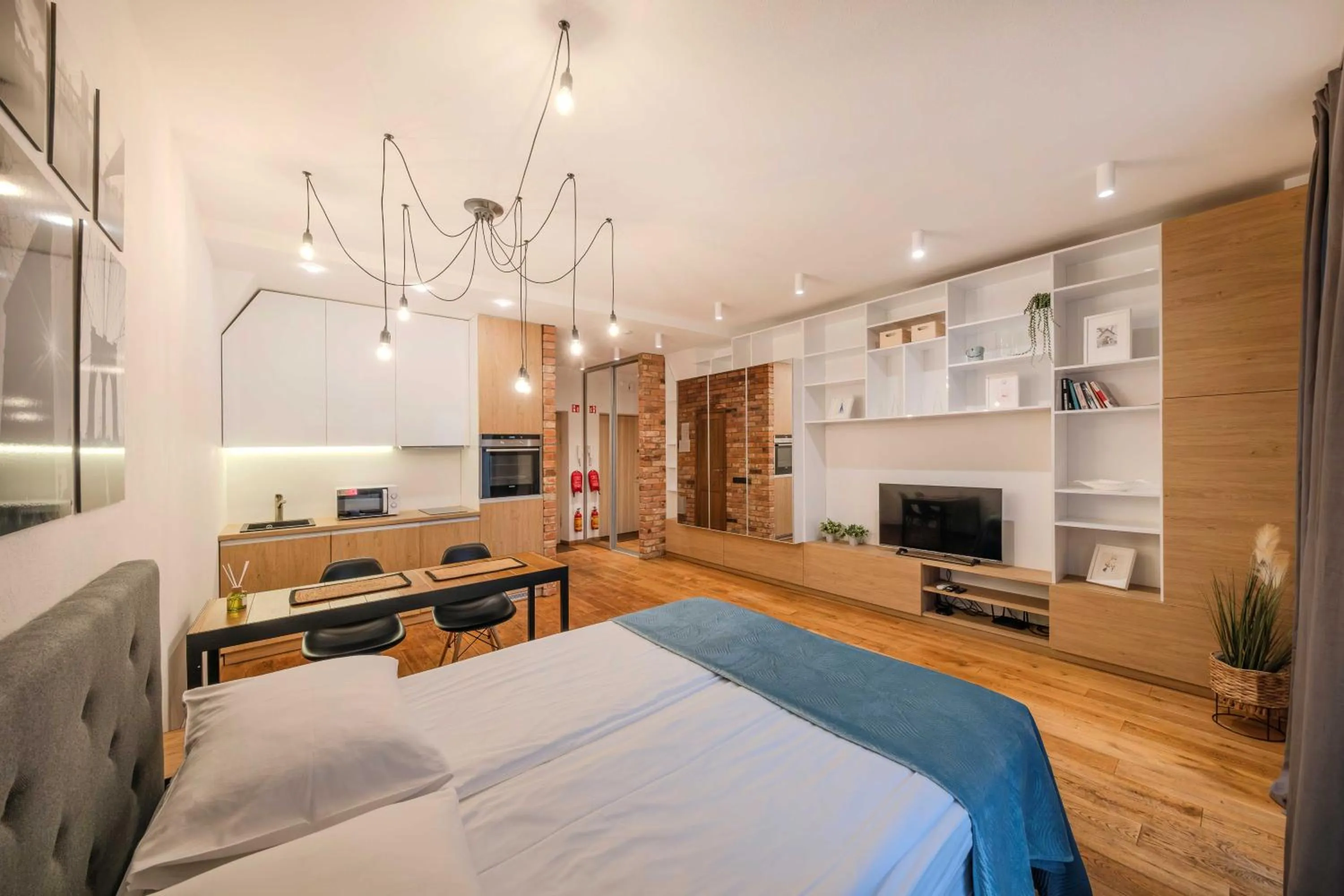 TV and multimedia, Bed in King Mindaugas Apartments