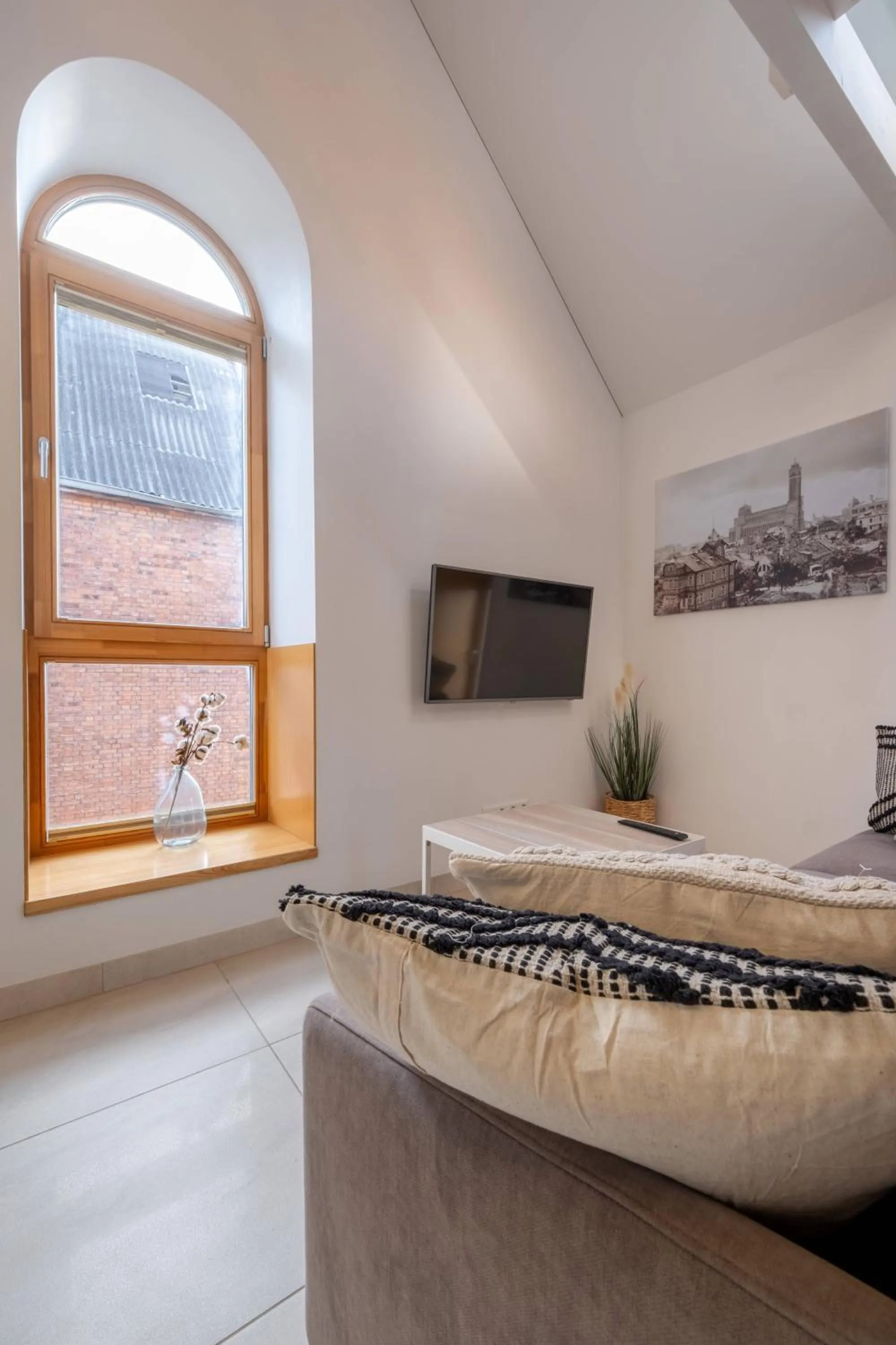 Communal lounge/ TV room in King Mindaugas Apartments