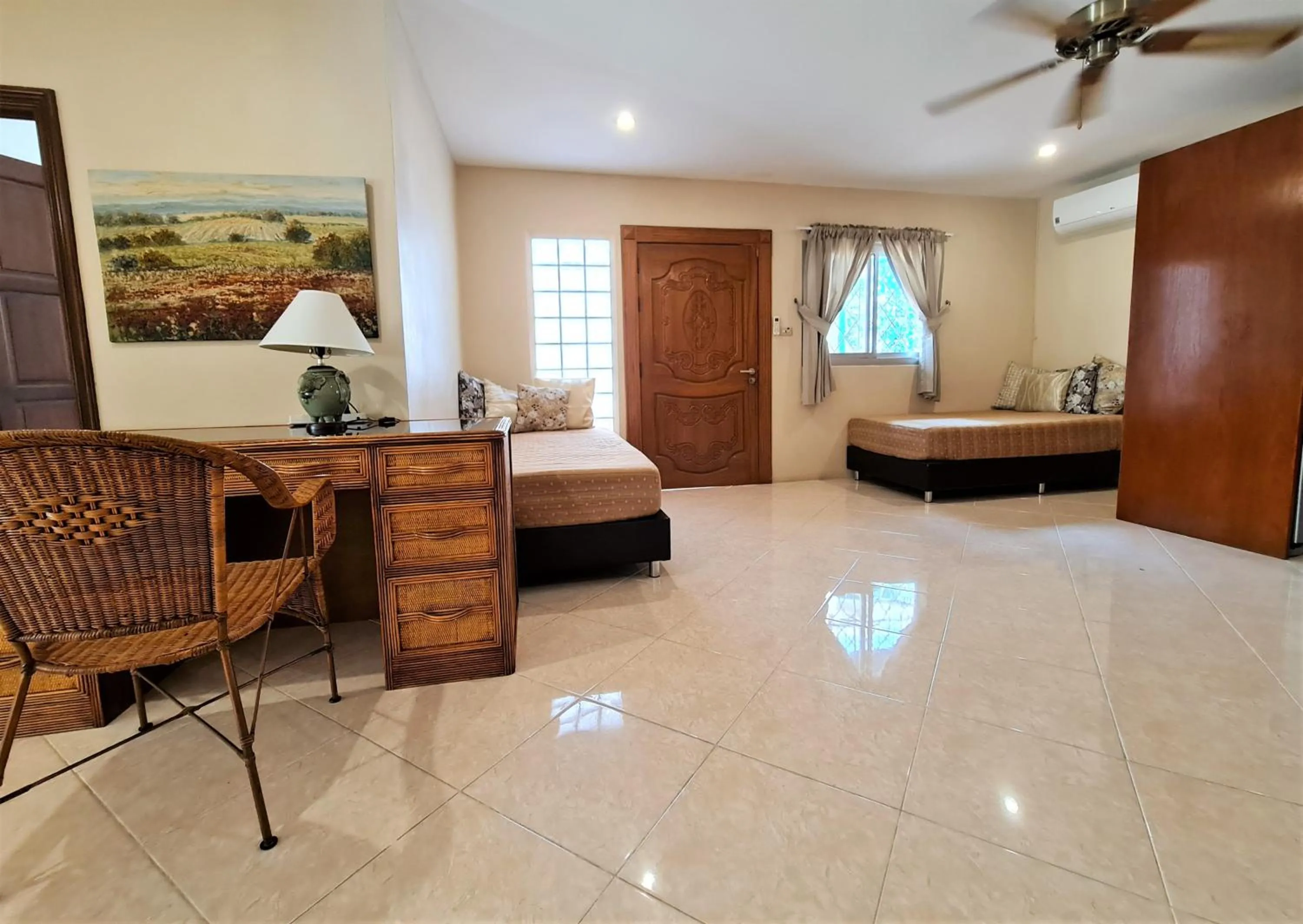 Bed in Butterfly Garden Boutique Residences by Luxury View SHA Extra Plus