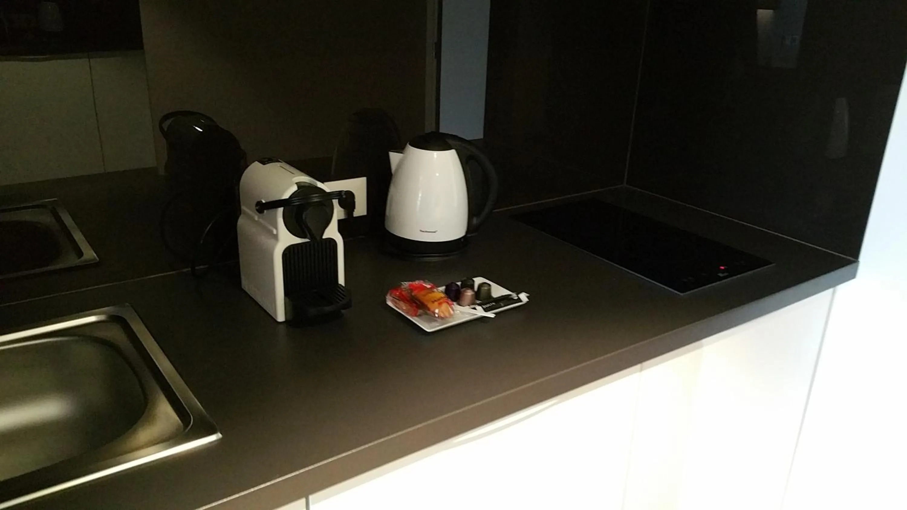 Kitchen or kitchenette in All Suites Appart Hôtel - Bordeaux - Pessac