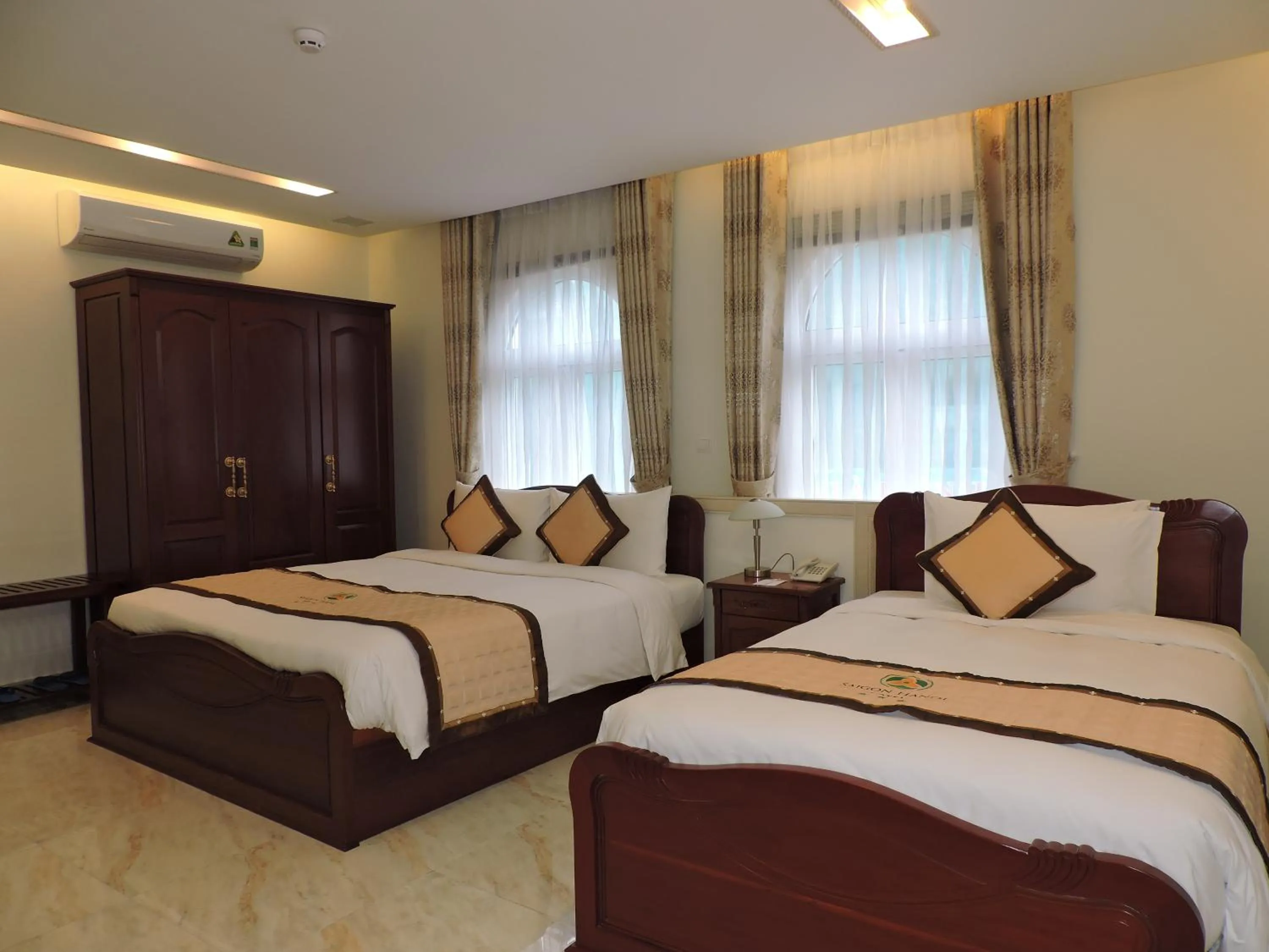 Photo of the whole room, Bed in Minh Tam Phu Nhuan Hotel & Spa