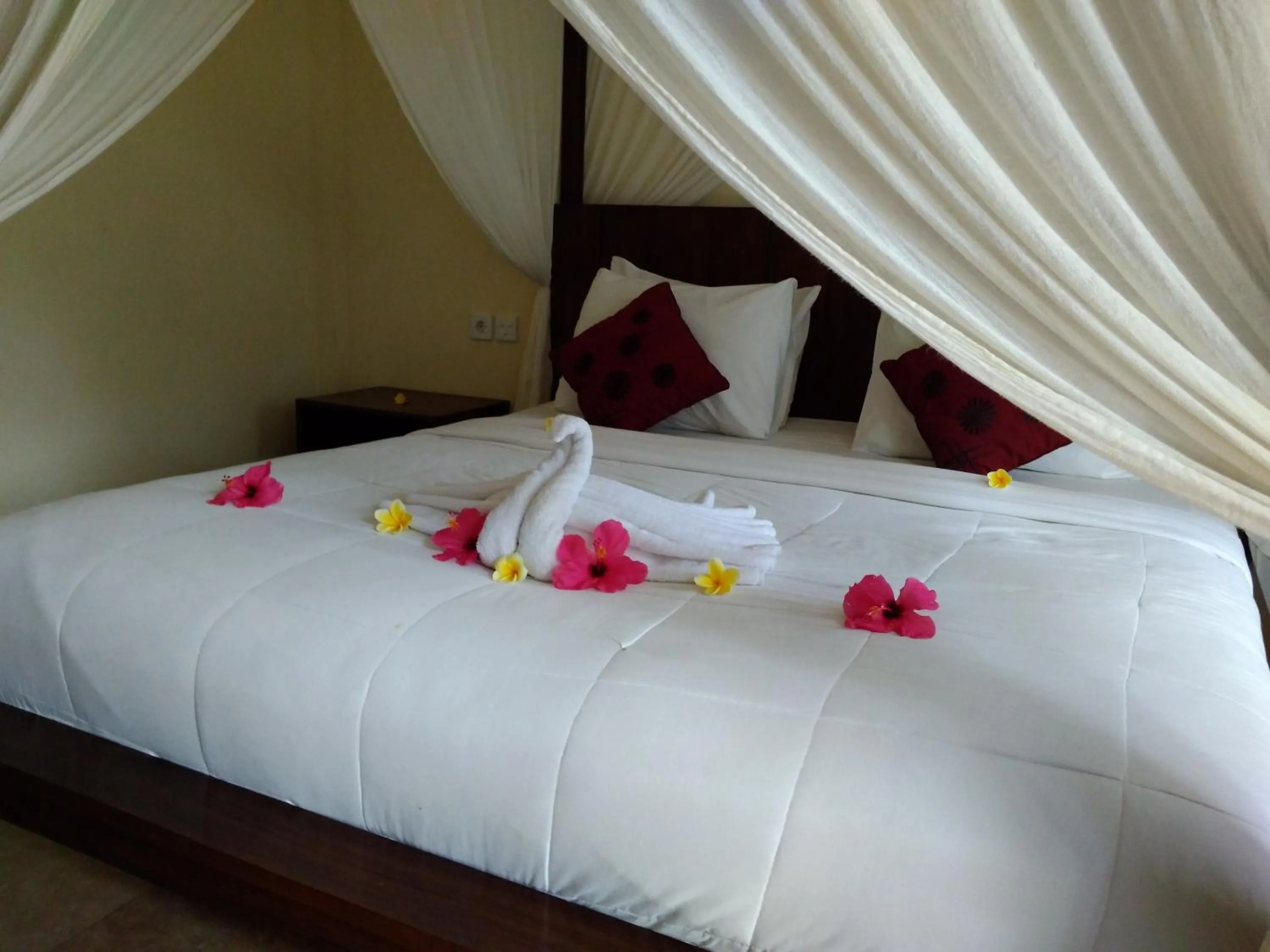 Bed in Kartika Bungalows