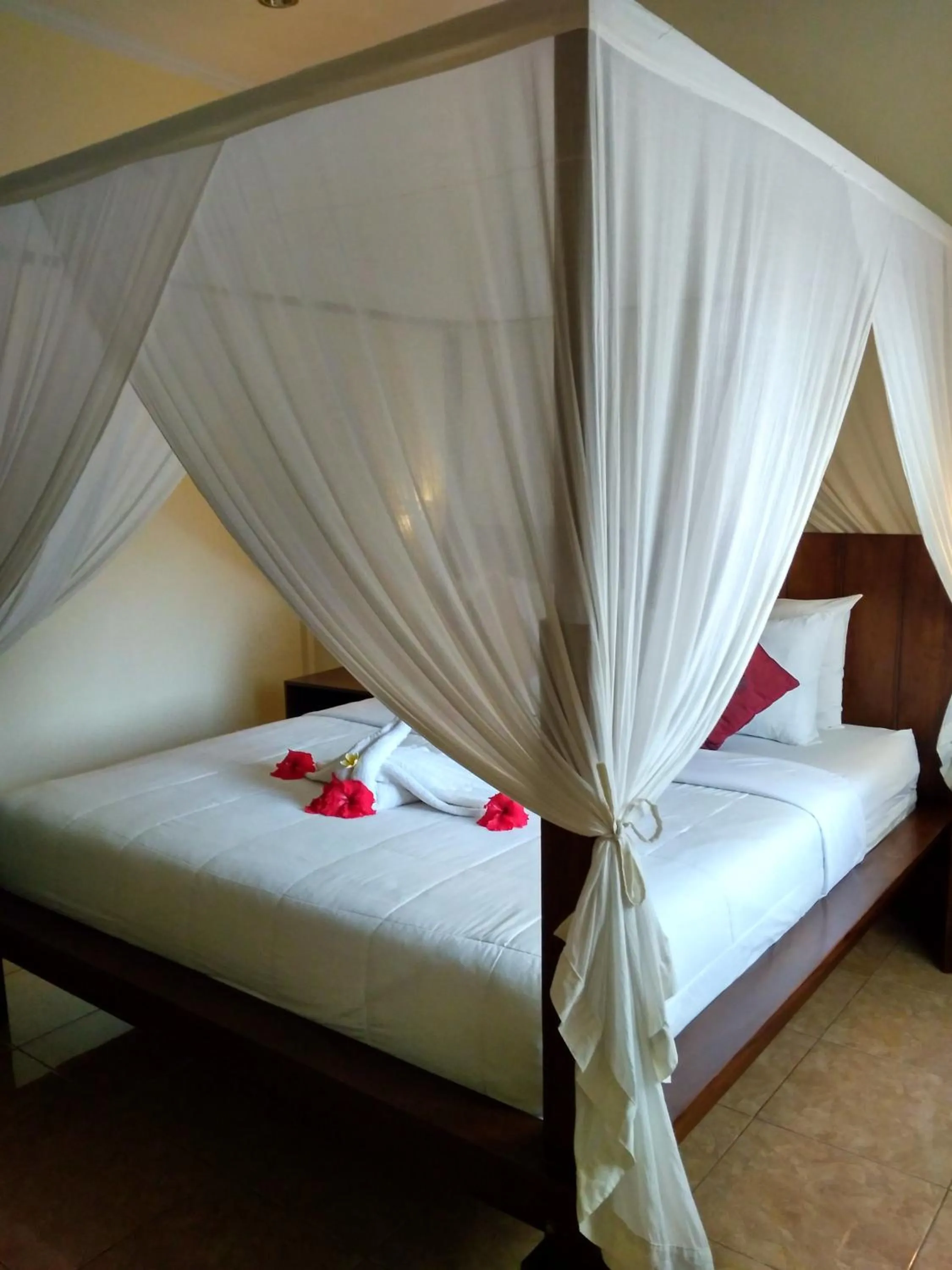 Bed in Kartika Bungalows