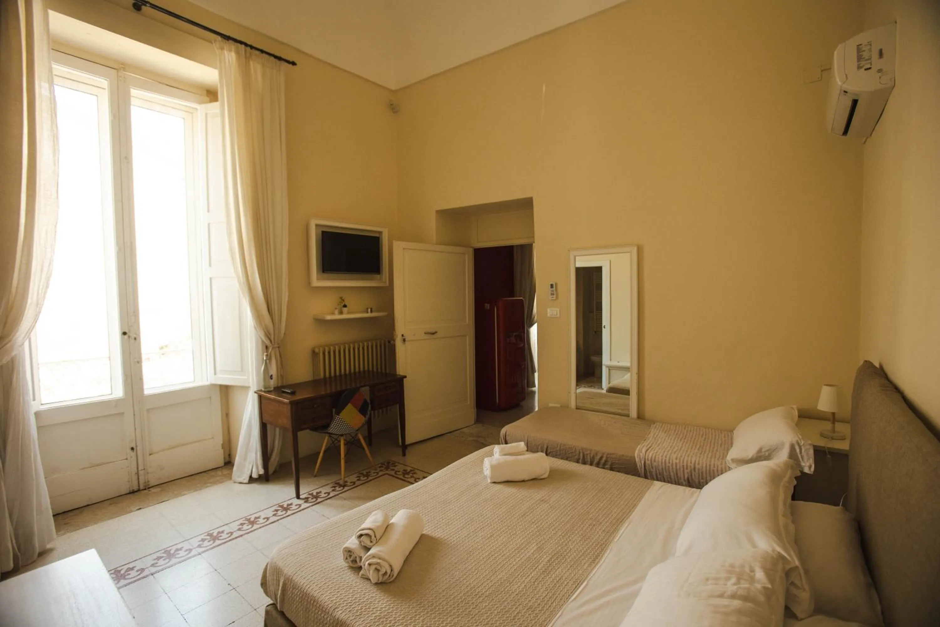 Bed in 4 Balconi rooms-Boutique B&B