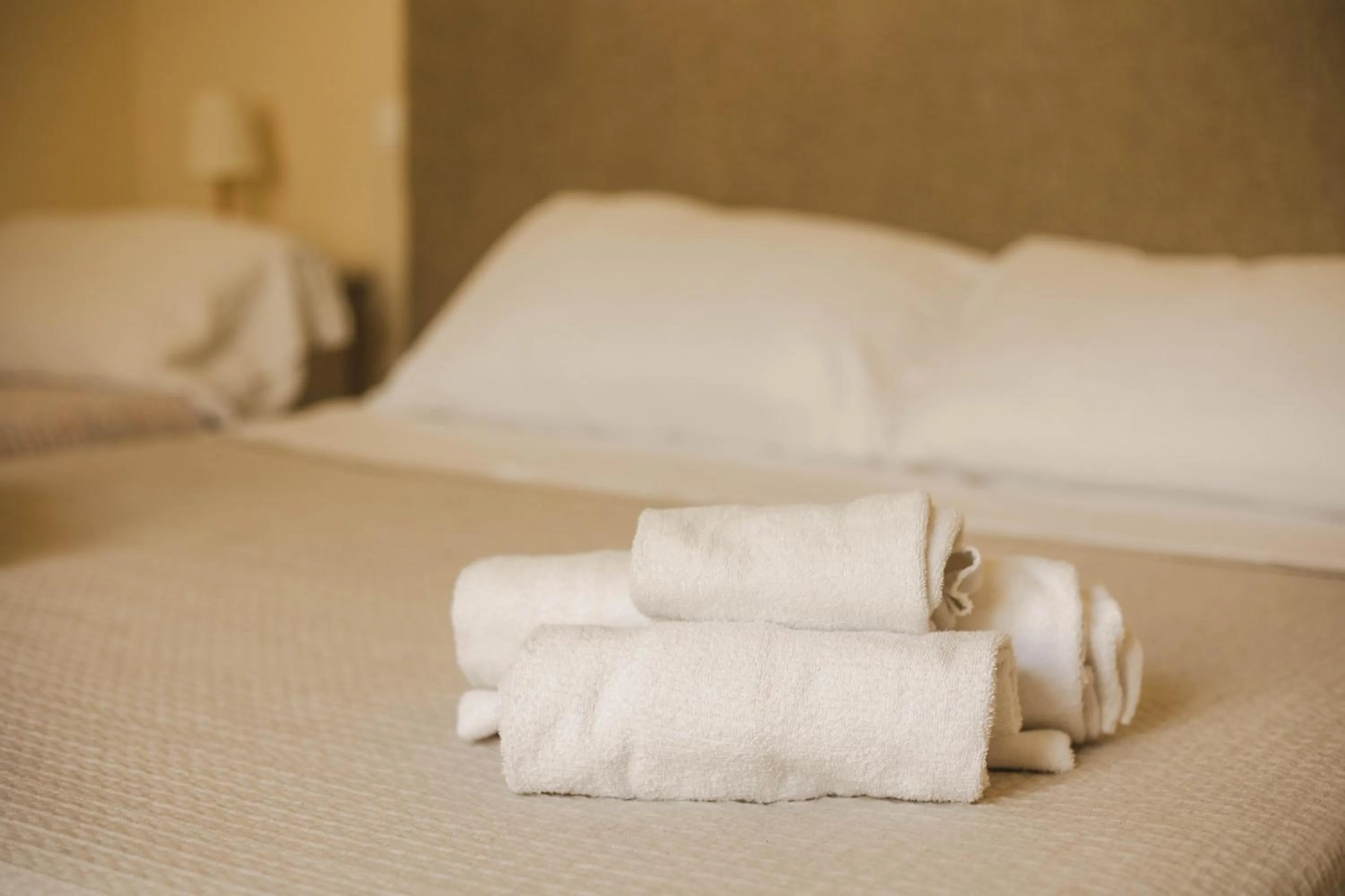 towels, Bed in 4 Balconi rooms-Boutique B&B
