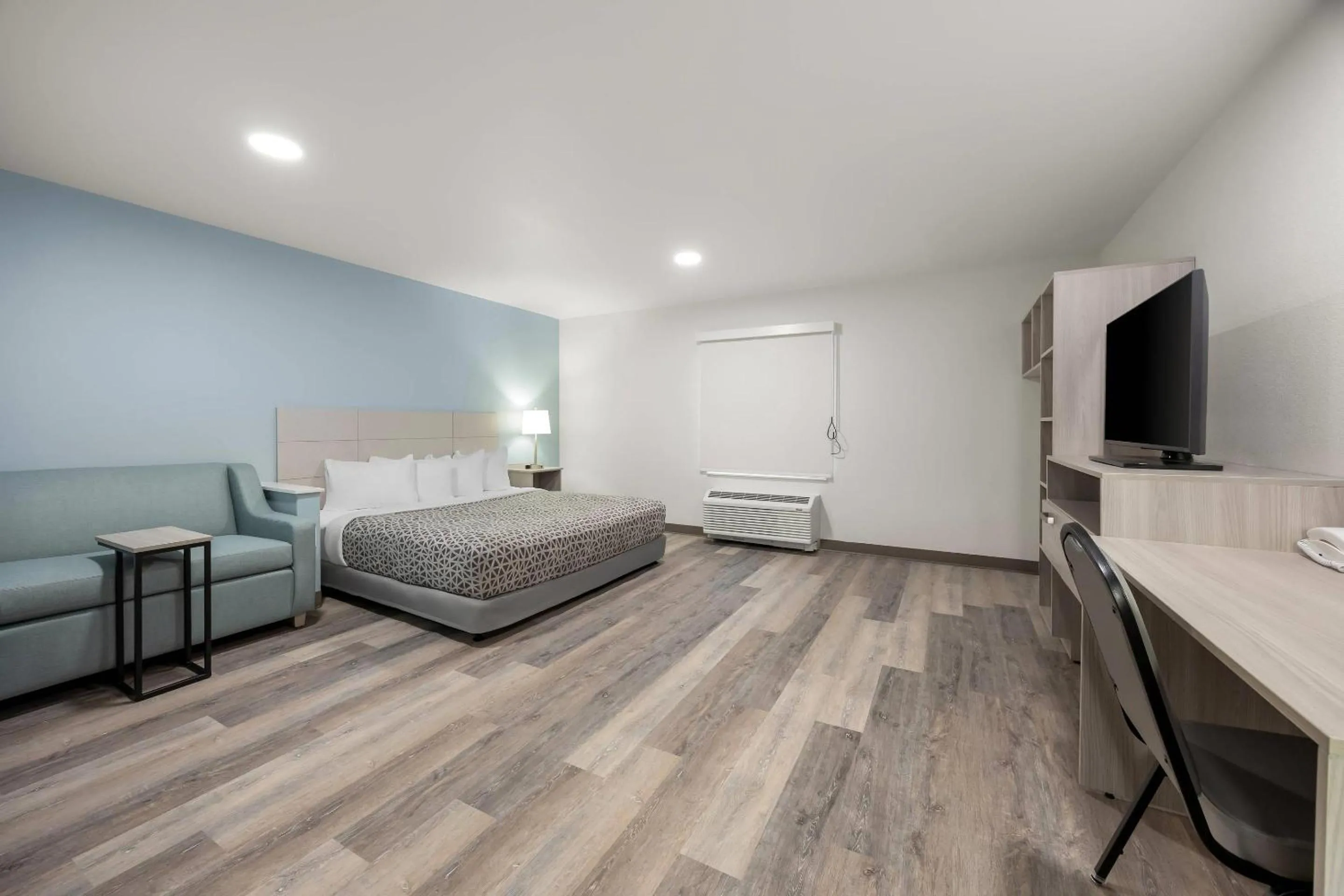 Bed in WoodSpring Suites Medford near I-5