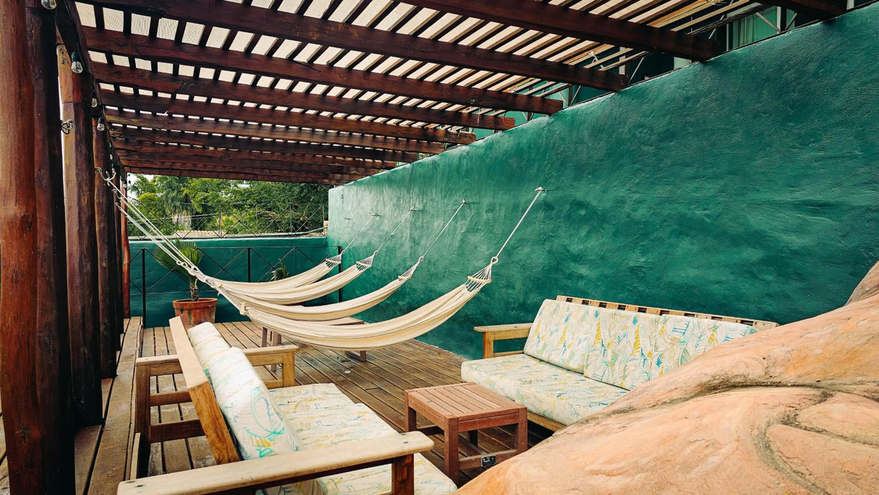Seating area in Viajero Bacalar Hostel