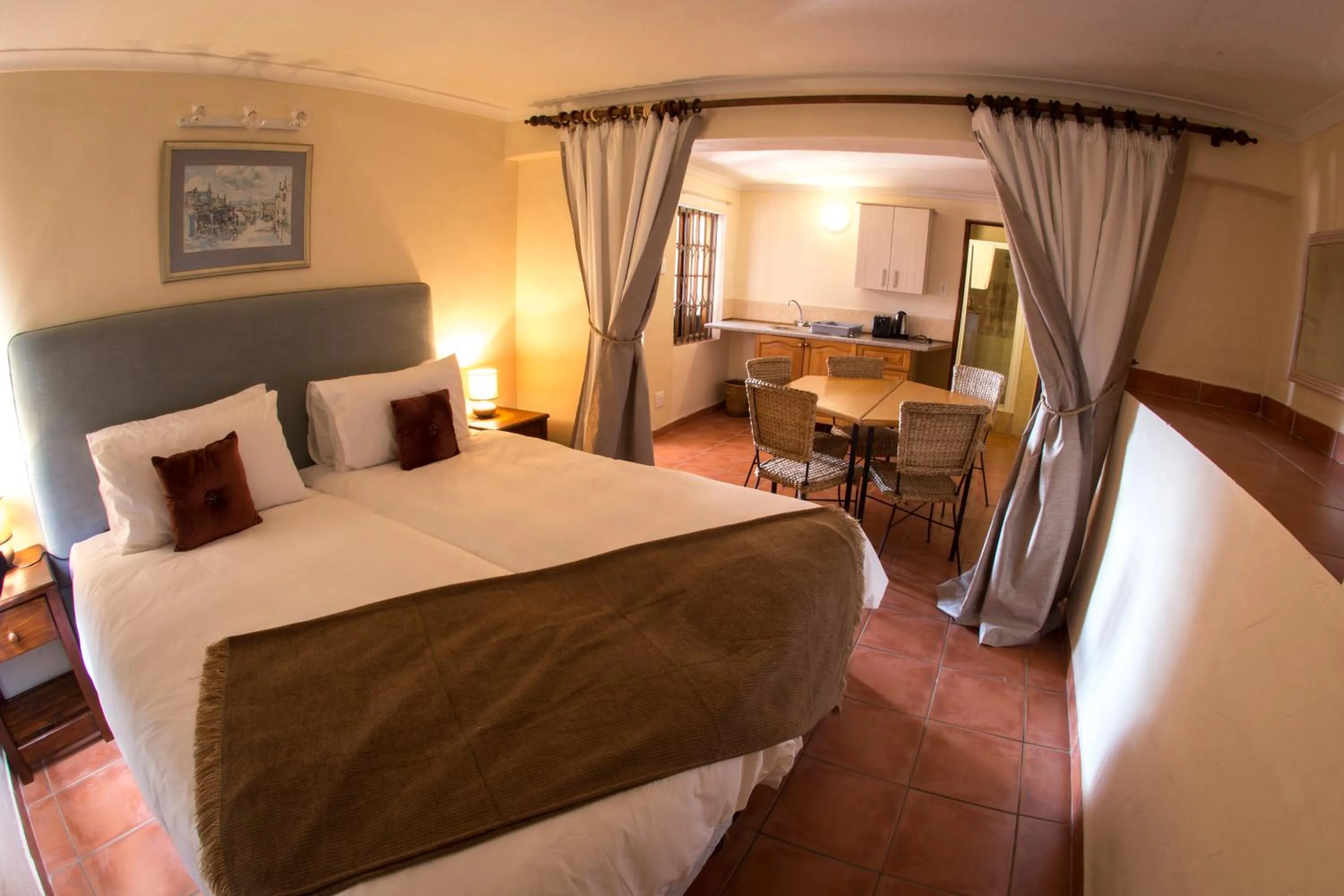 Bed in Winelands Villa Guesthouse and Cottages