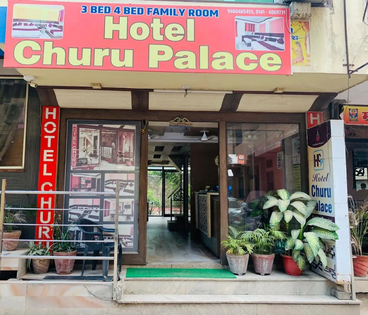 Property logo or sign in Hotel Churu Palace