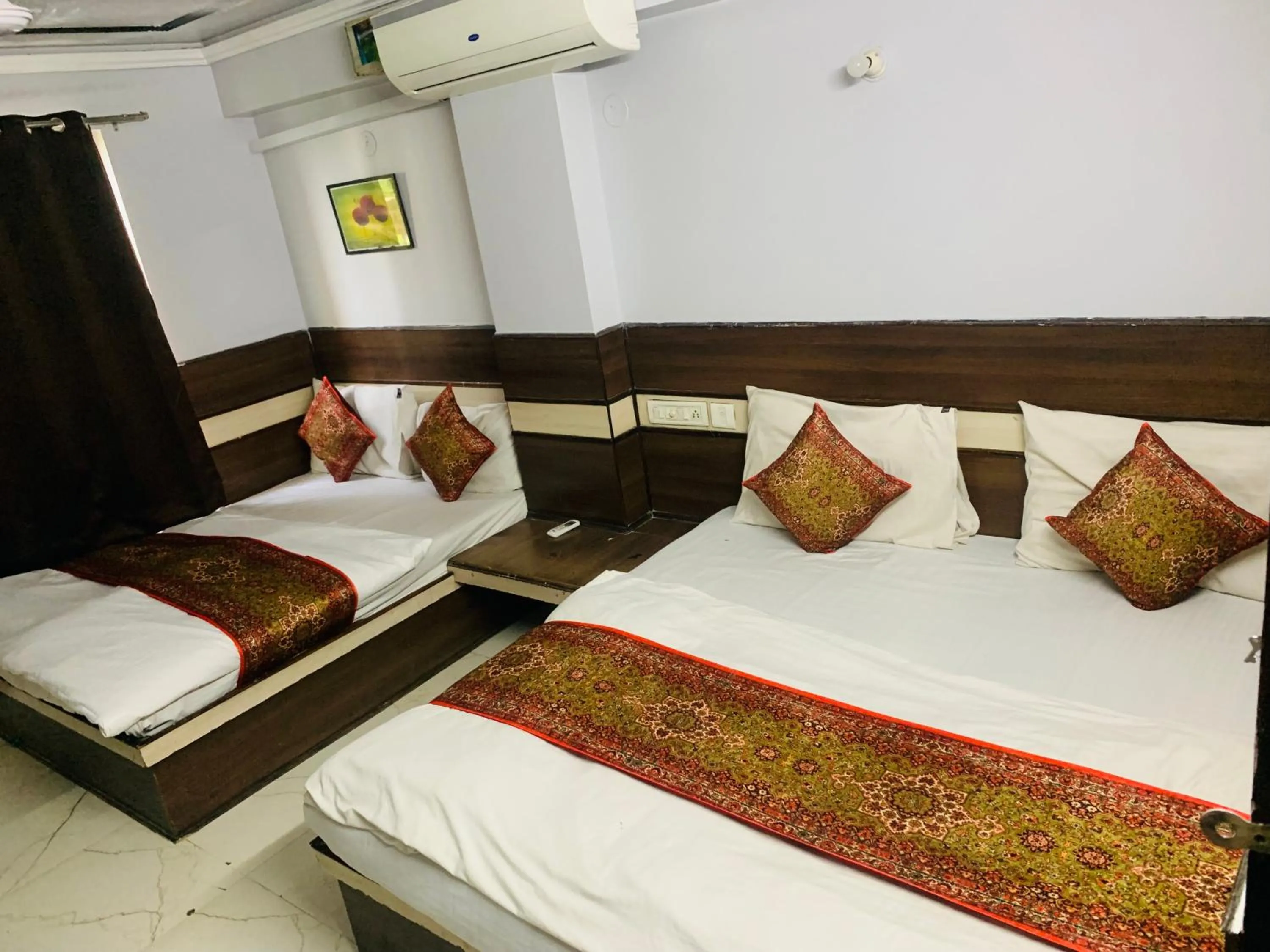 Bed in Hotel Churu Palace