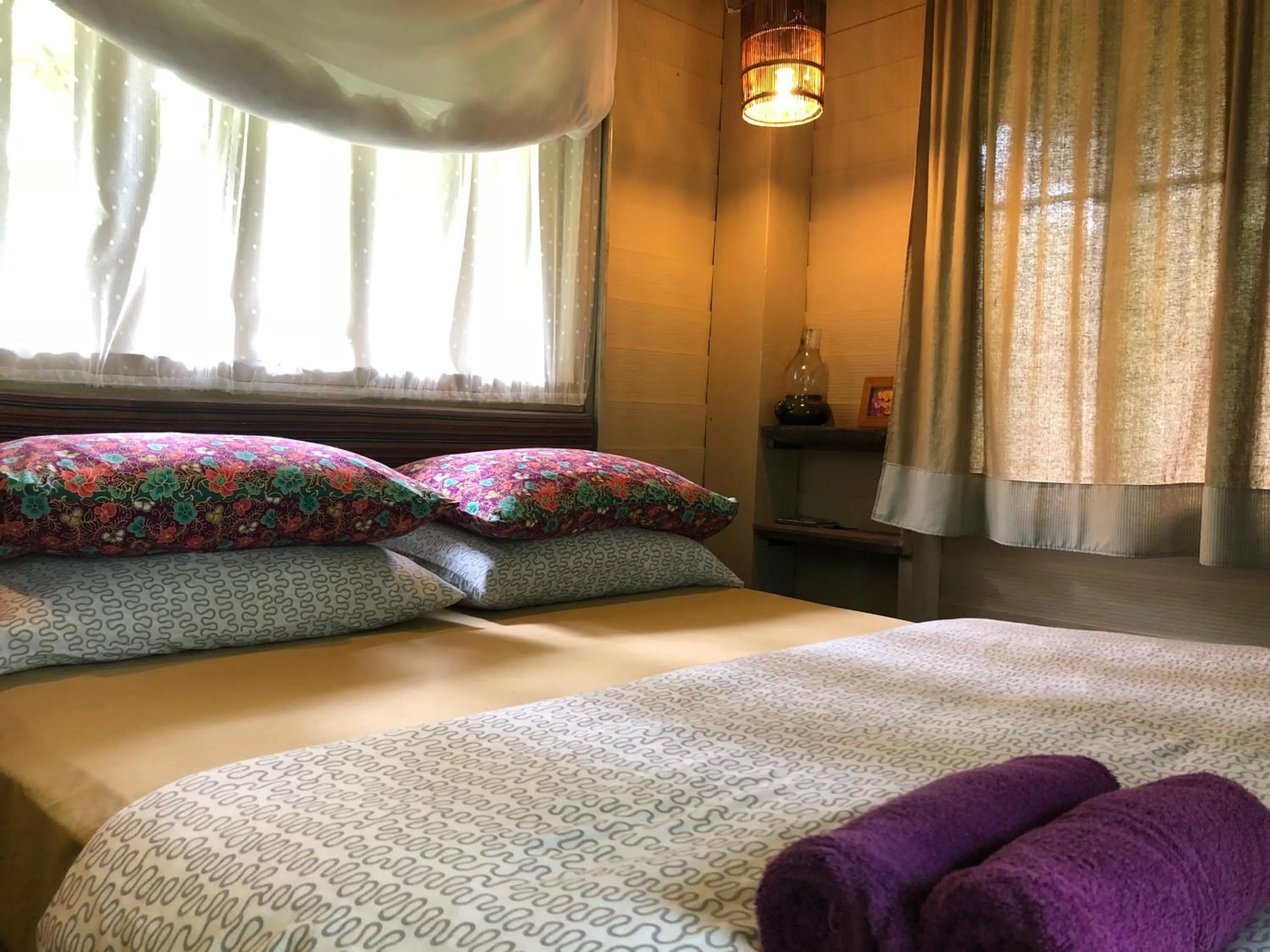 Bed in Bannamhoo Bungalows