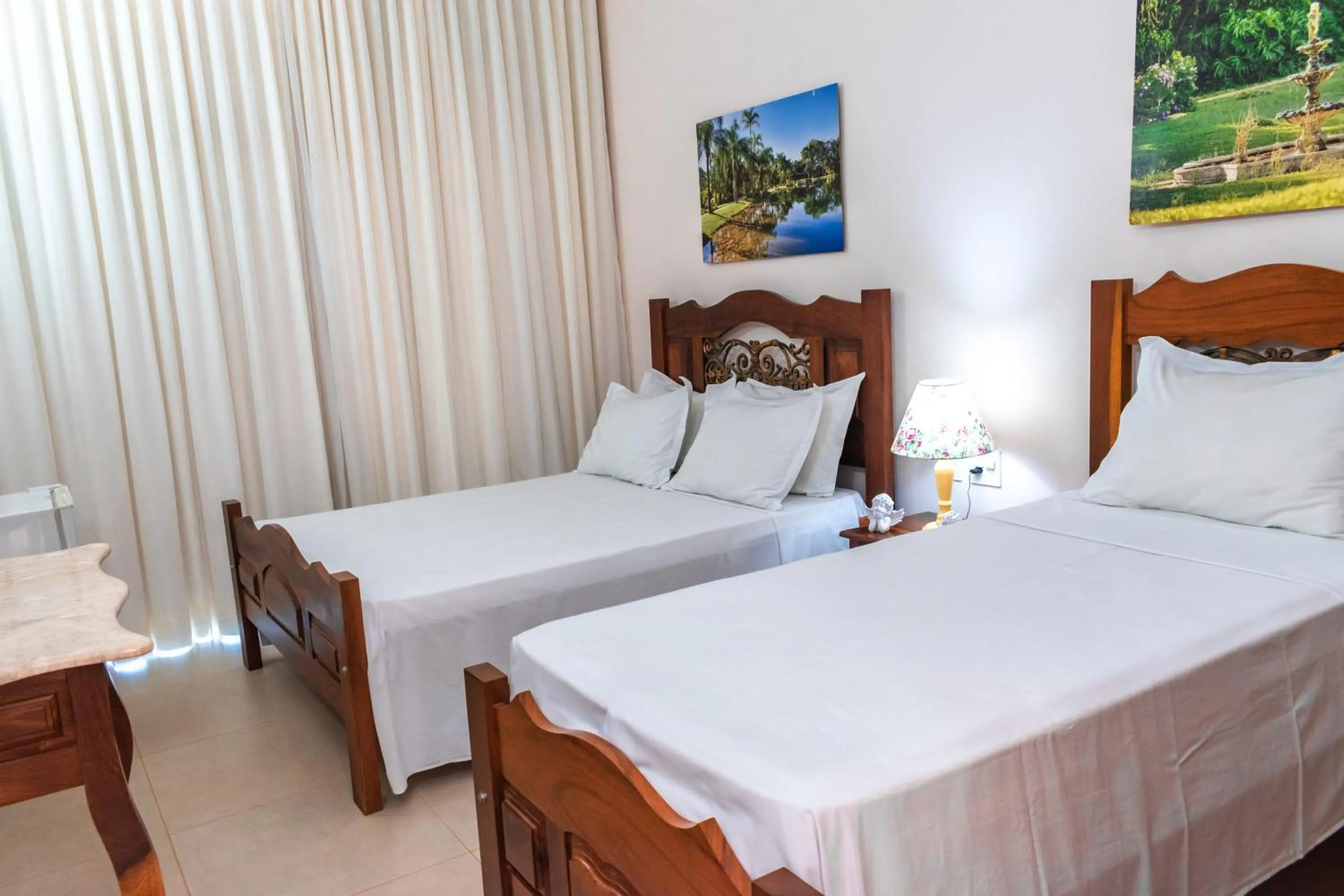 Bed in BellaMinas Pousada