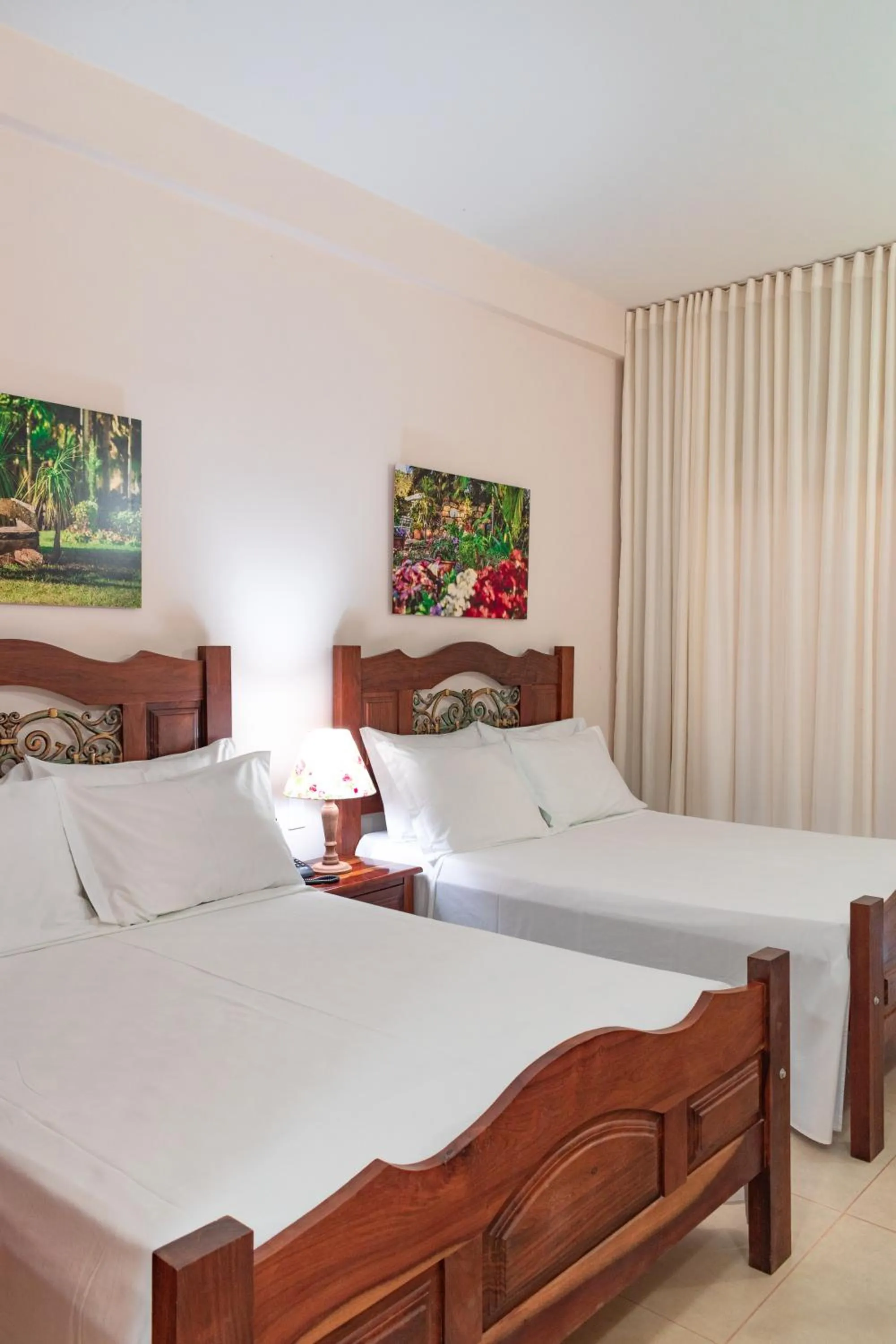 Bed in BellaMinas Pousada