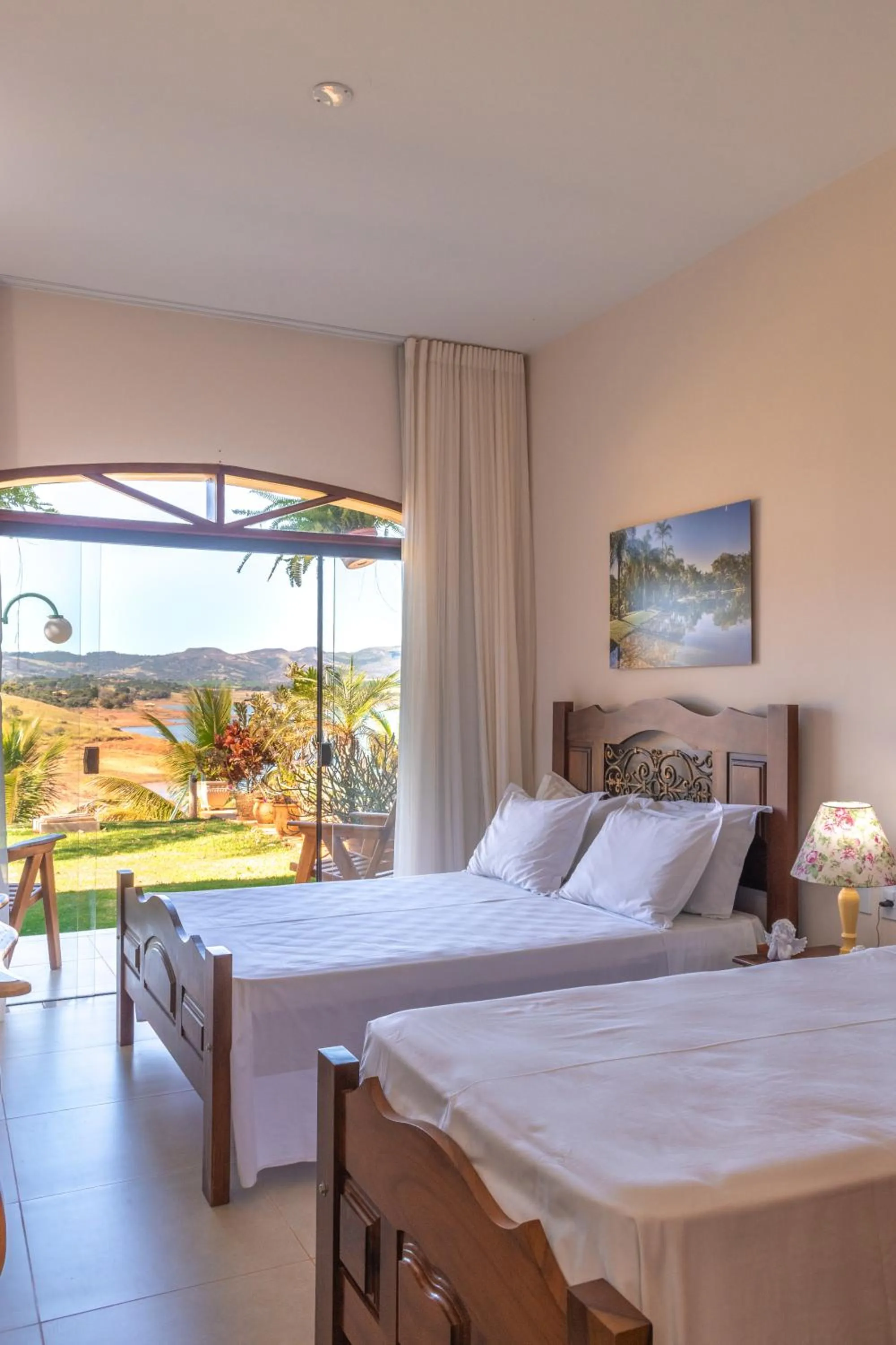 Bed in BellaMinas Pousada