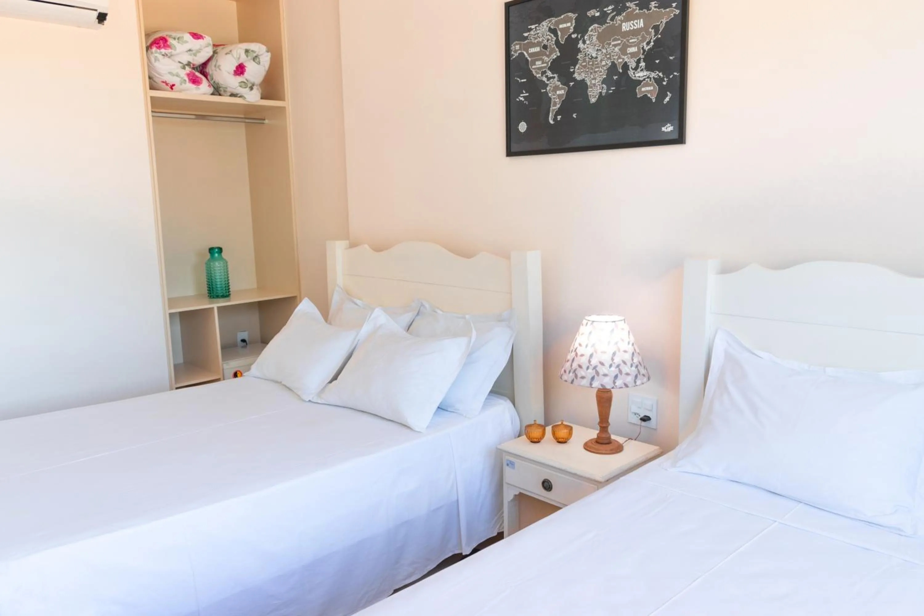 Bed in BellaMinas Pousada