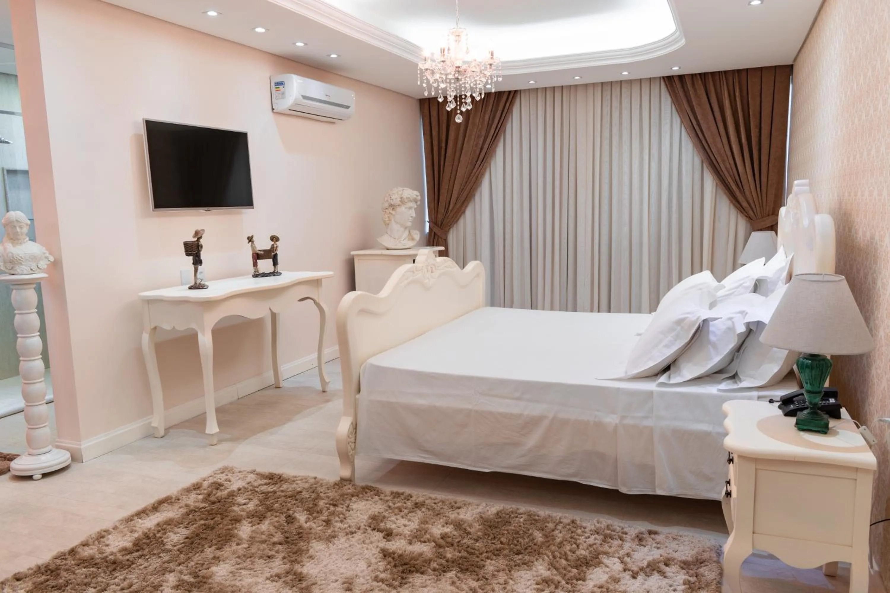 Bed in BellaMinas Pousada