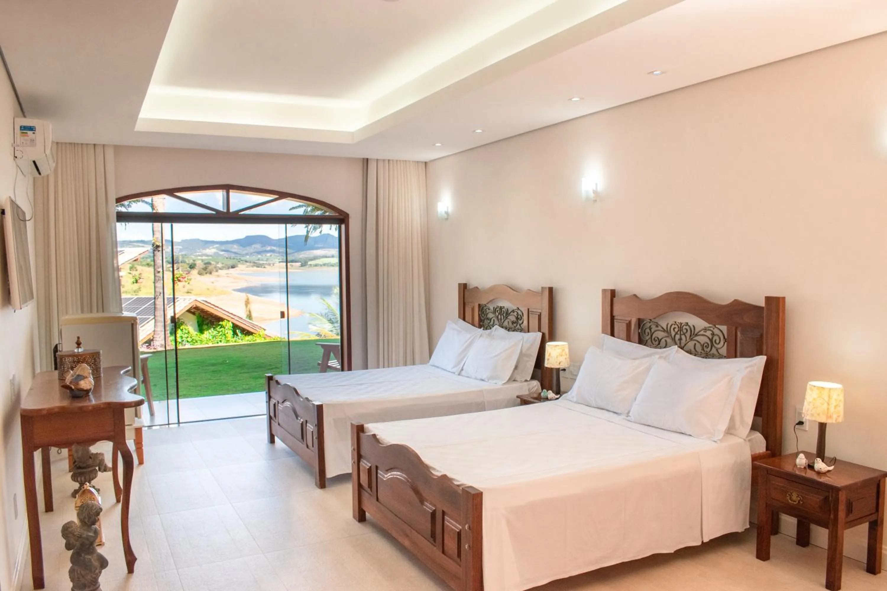 Bed in BellaMinas Pousada