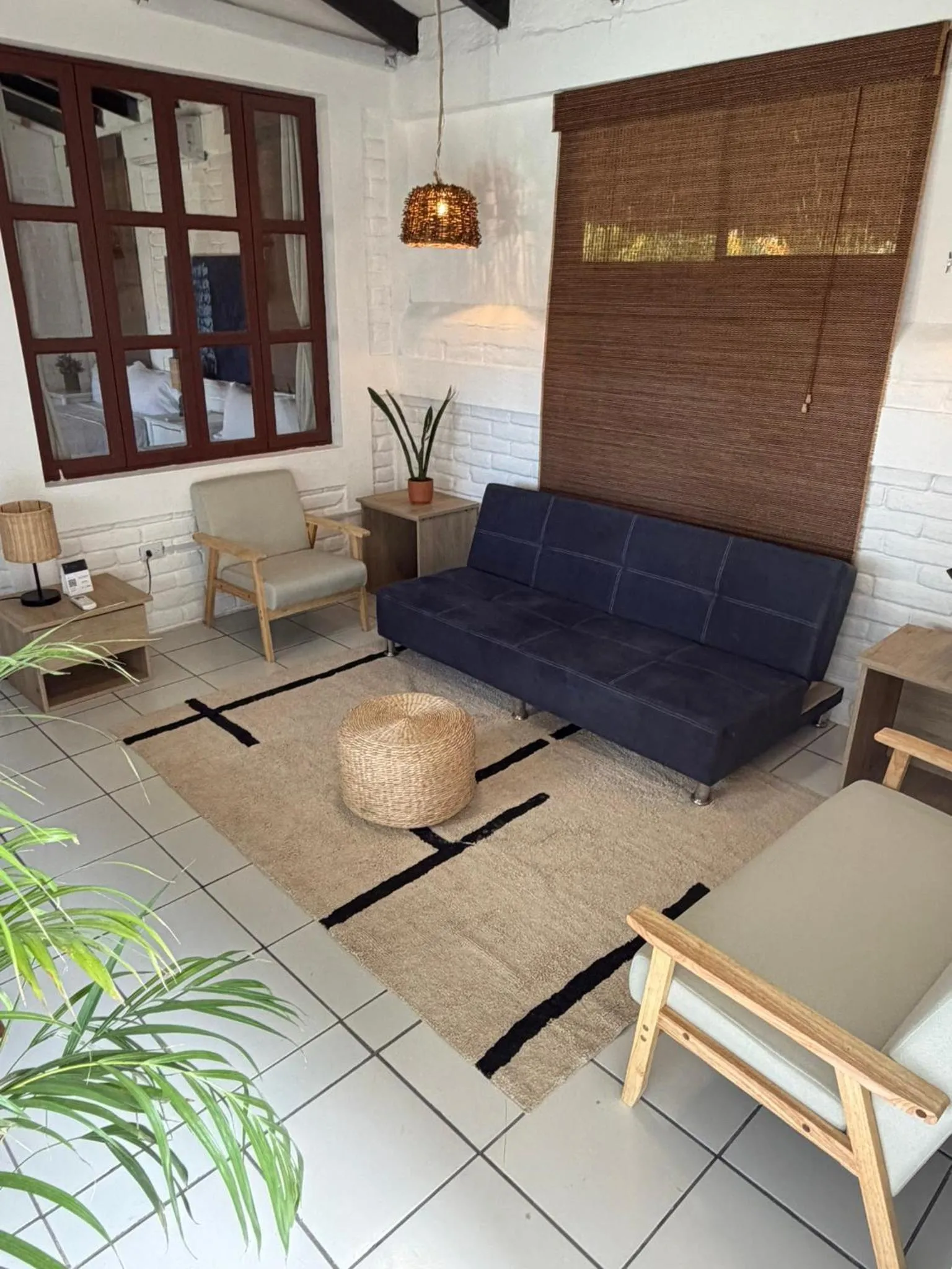 Seating area in Cardedeu Residence Cangrejera