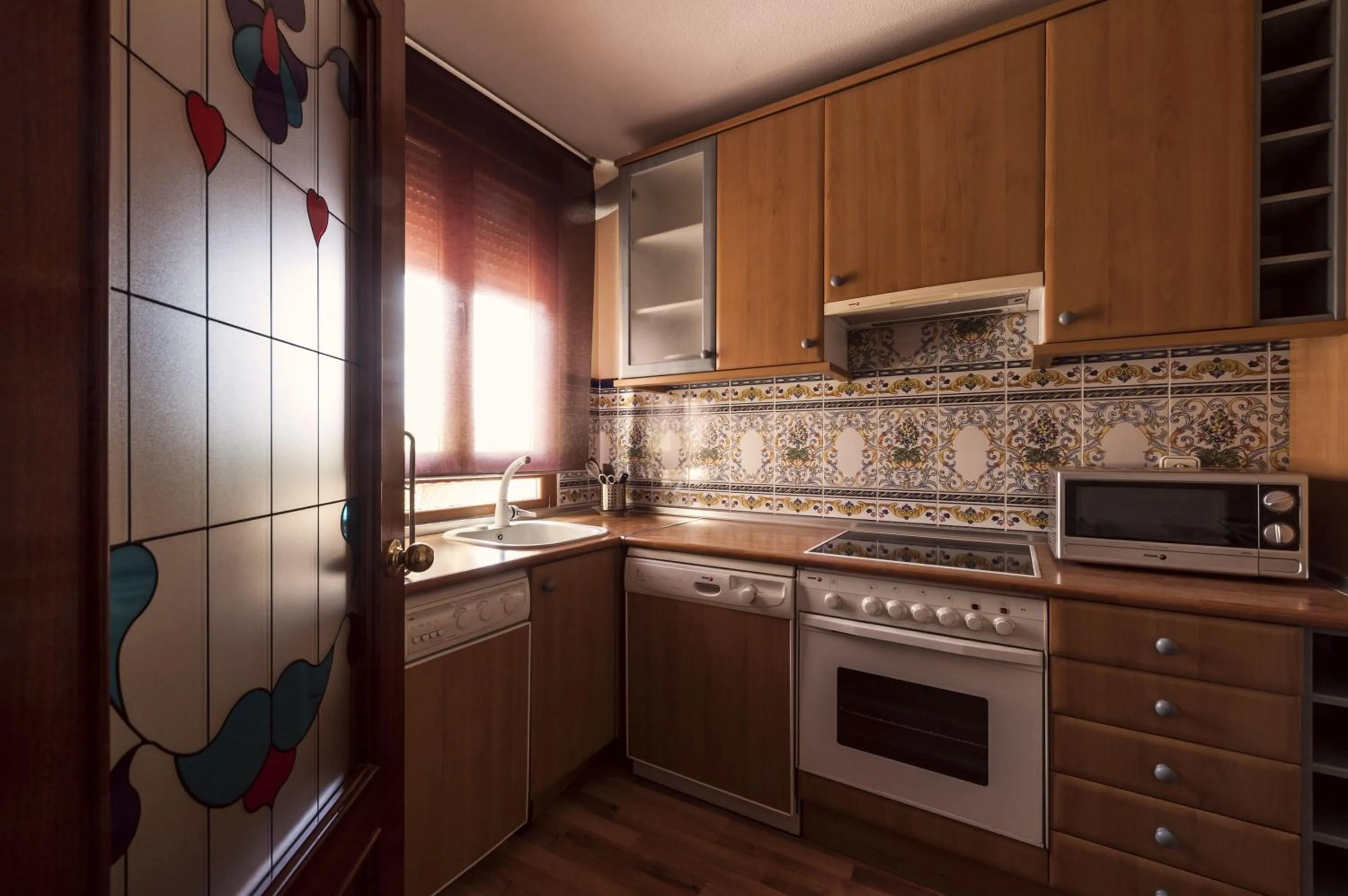 Kitchen or kitchenette in Atico-Terraza Imperial