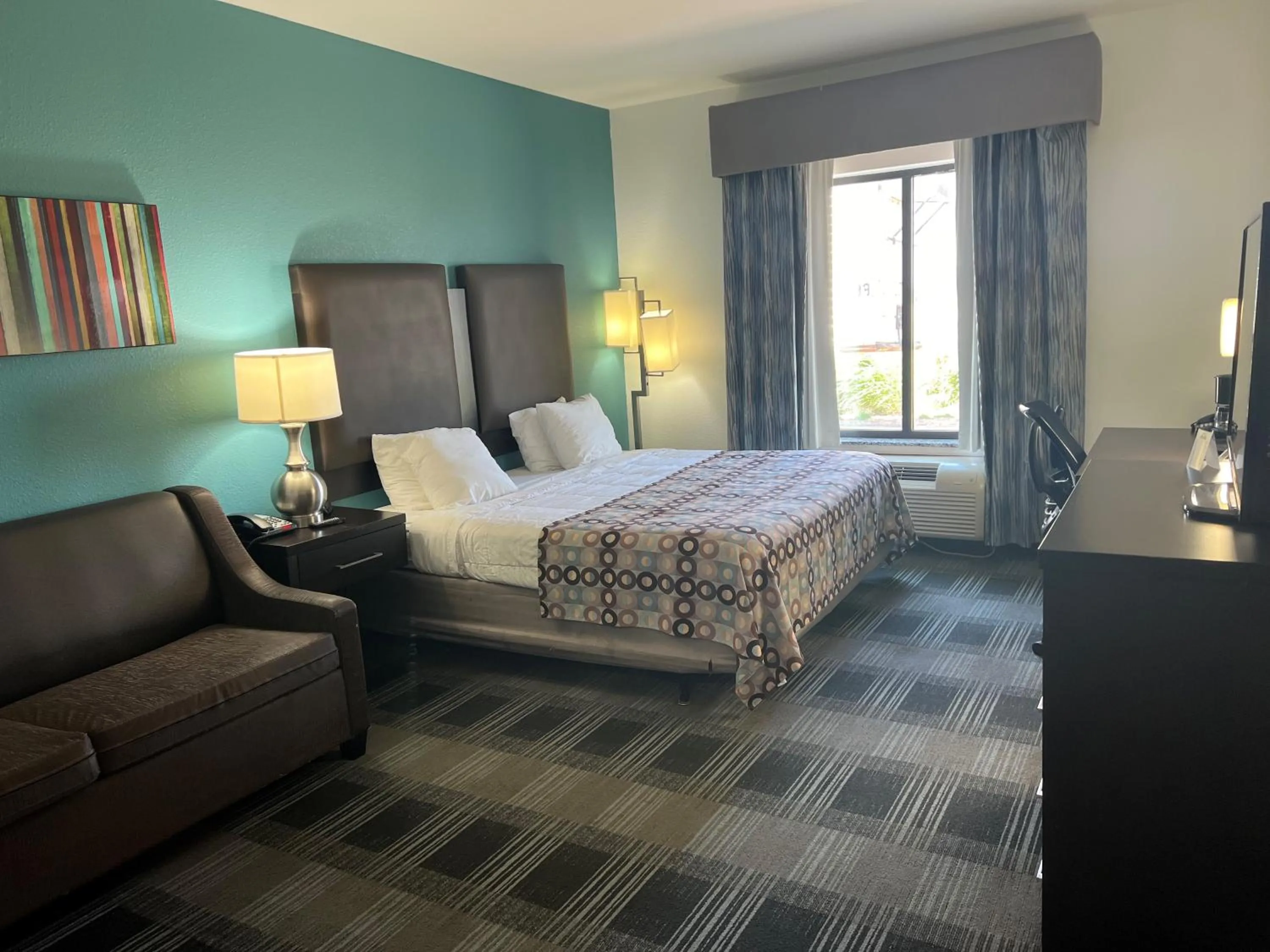 Seating area, Bed in Days Inn by Wyndham Alva