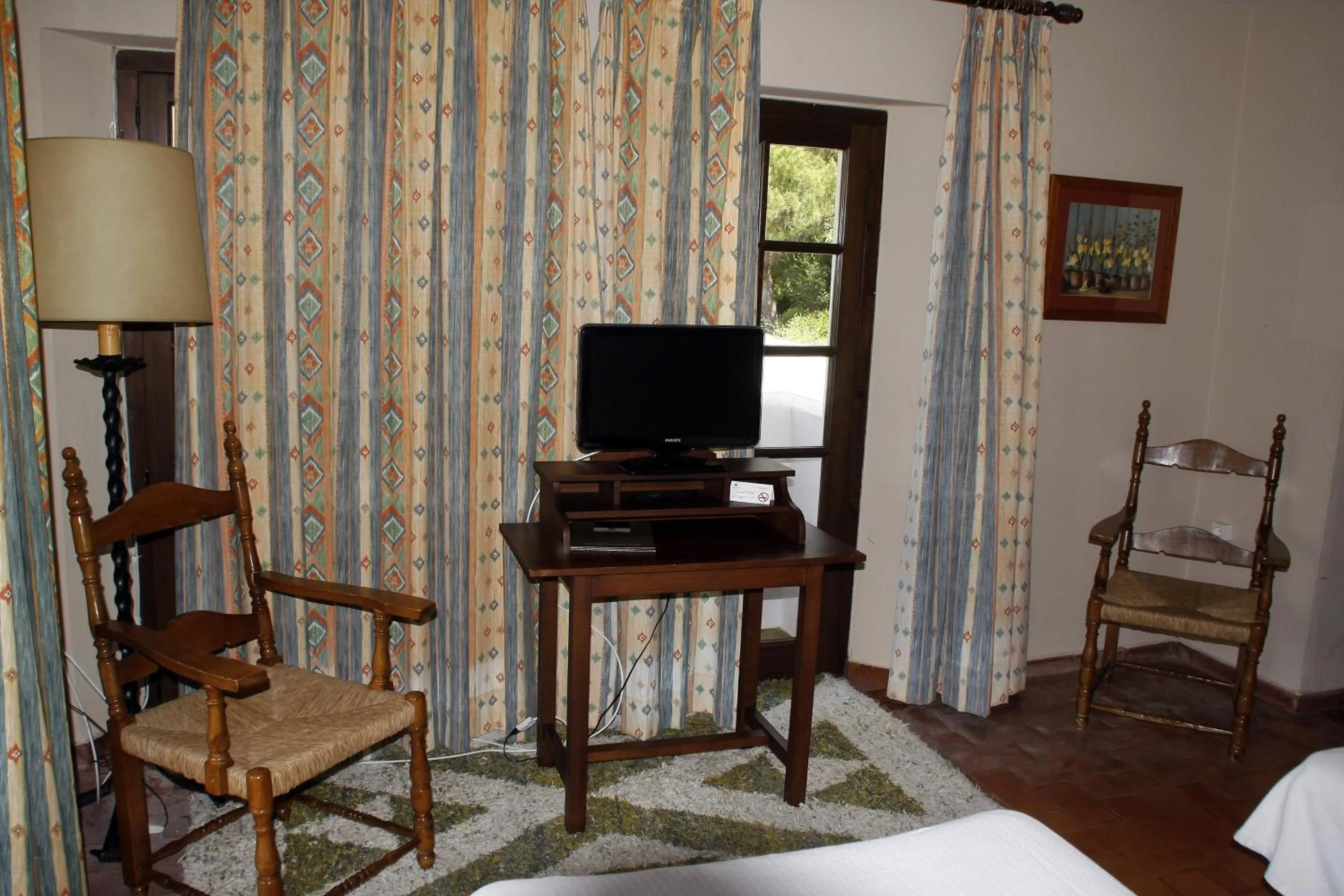 Seating area, Bed in Villa Turística de Grazalema