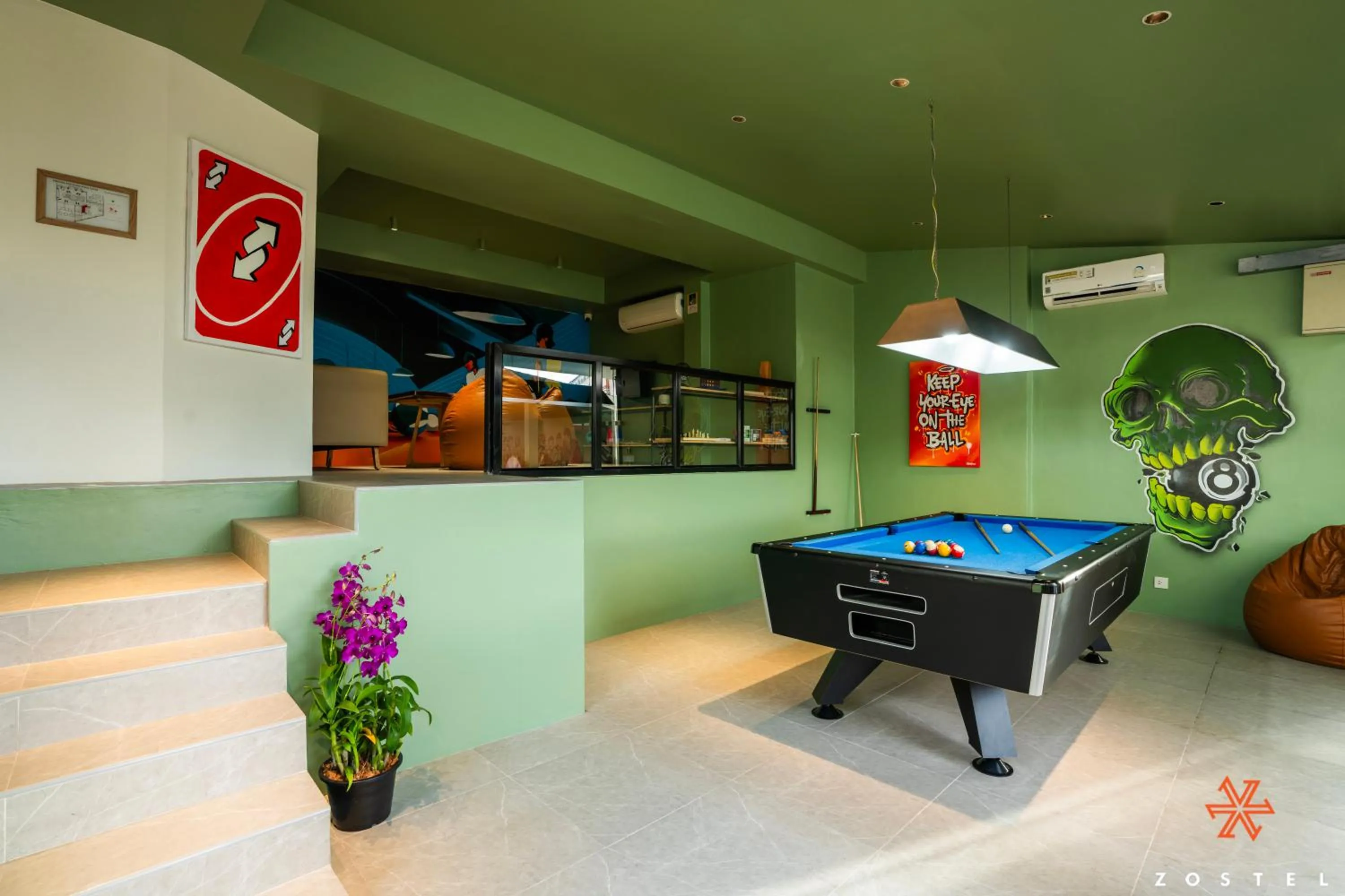 Communal lounge/ TV room in Zostel Phuket