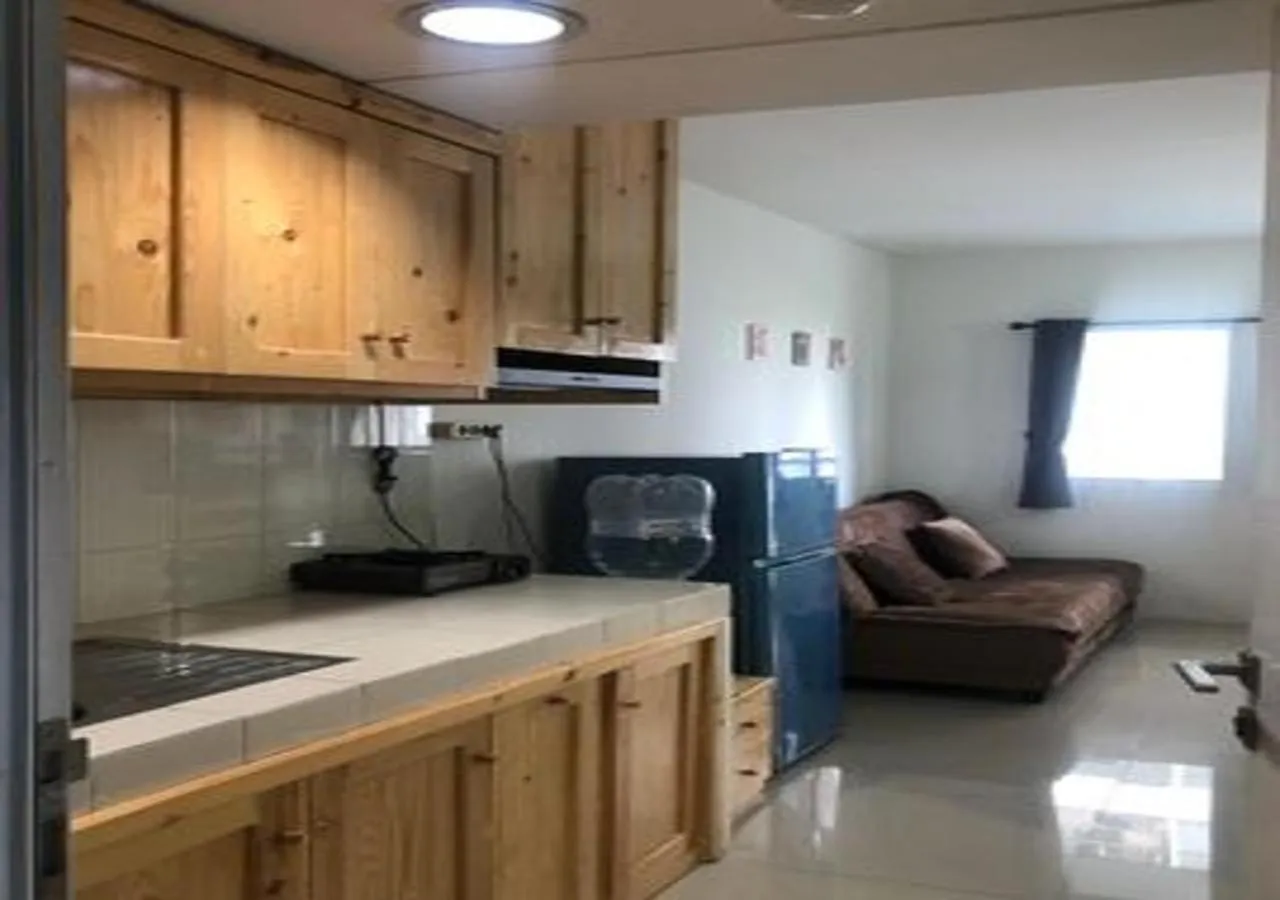 Kitchen or kitchenette in Laguna Room at Apartment Grand Sentraland Karawang