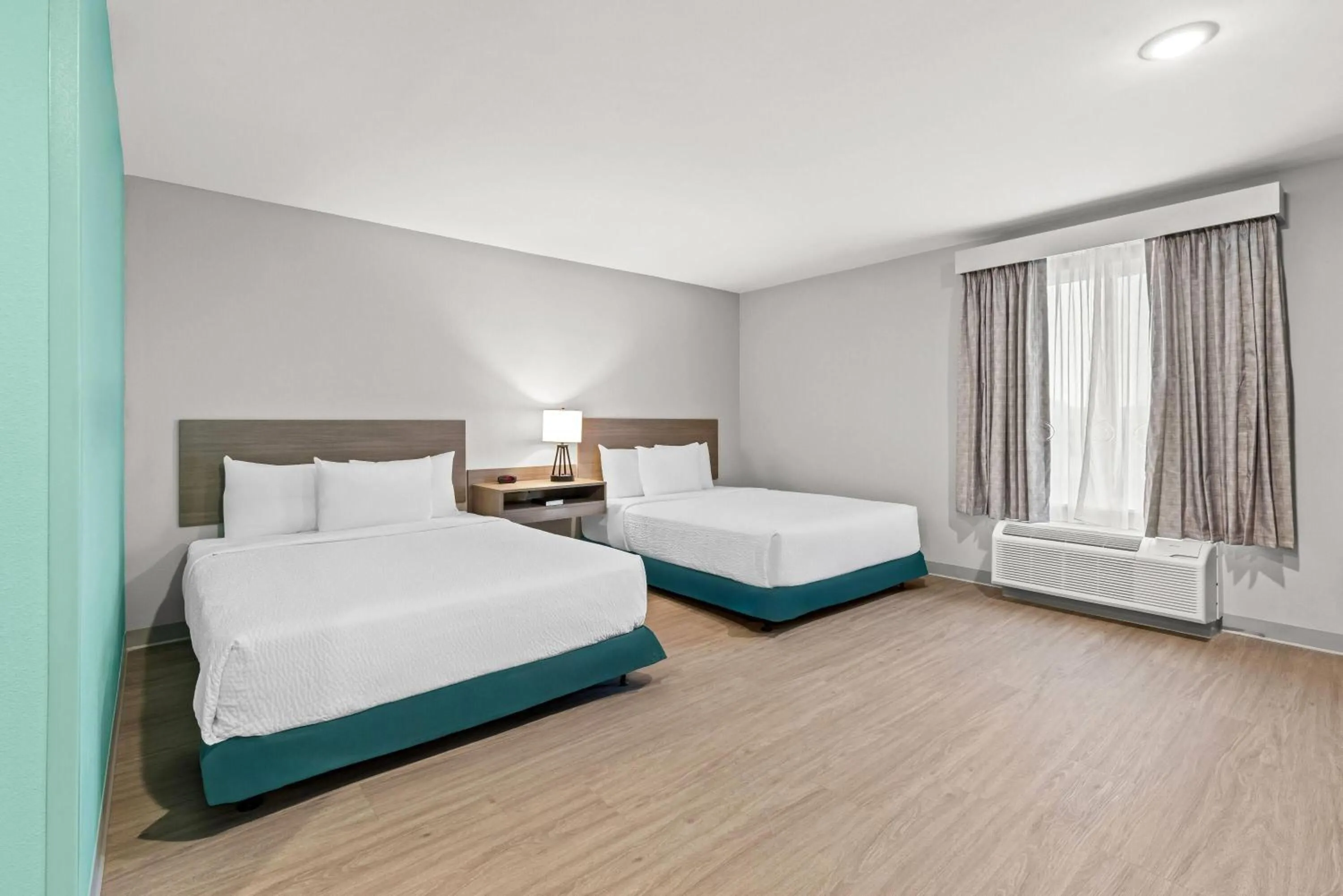 Bed in Echo Suites Extended Stay by Wyndham Atlanta-Conyers