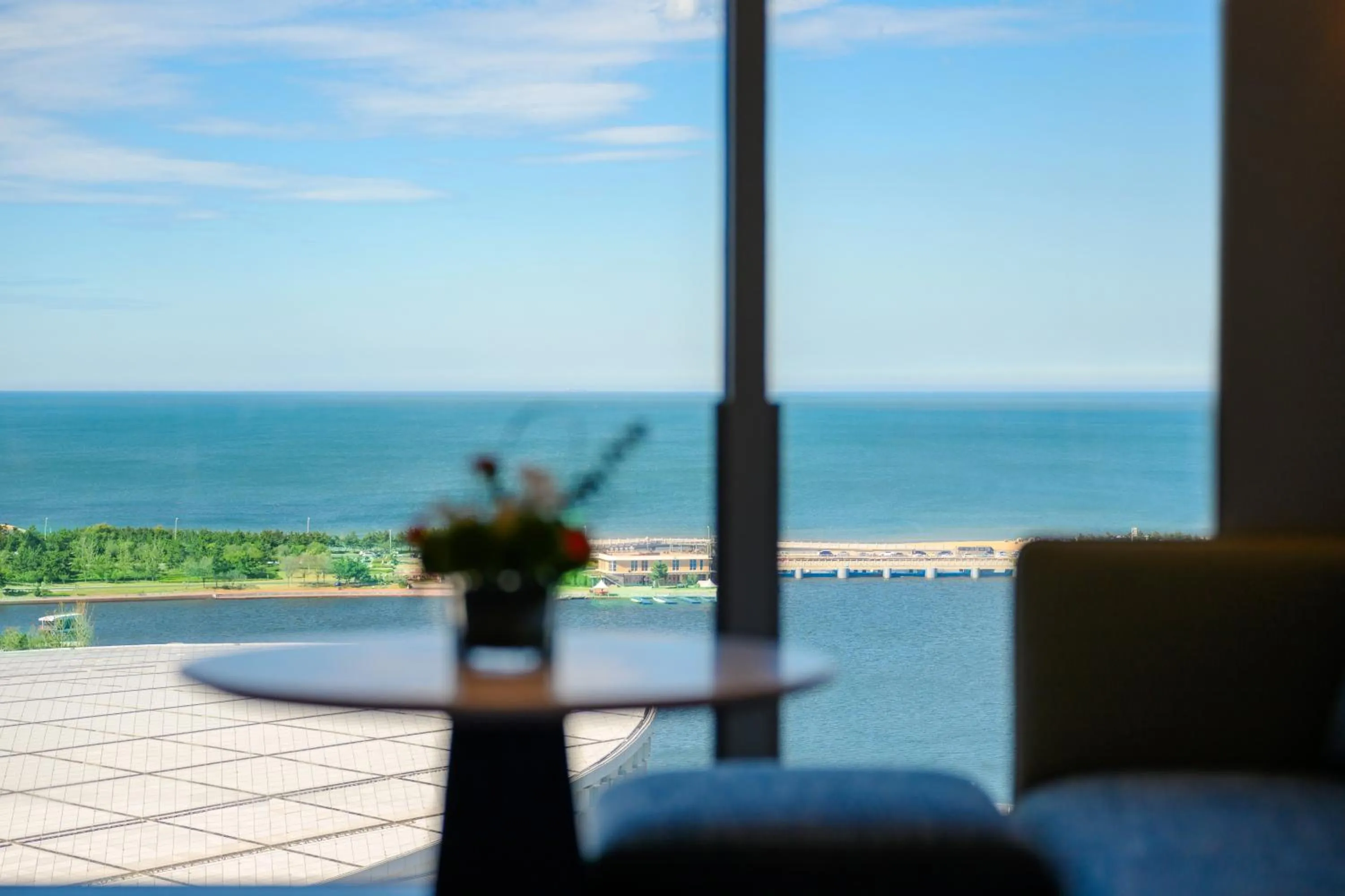 Seating area in Crowne Plaza Weihai Binhai by IHG