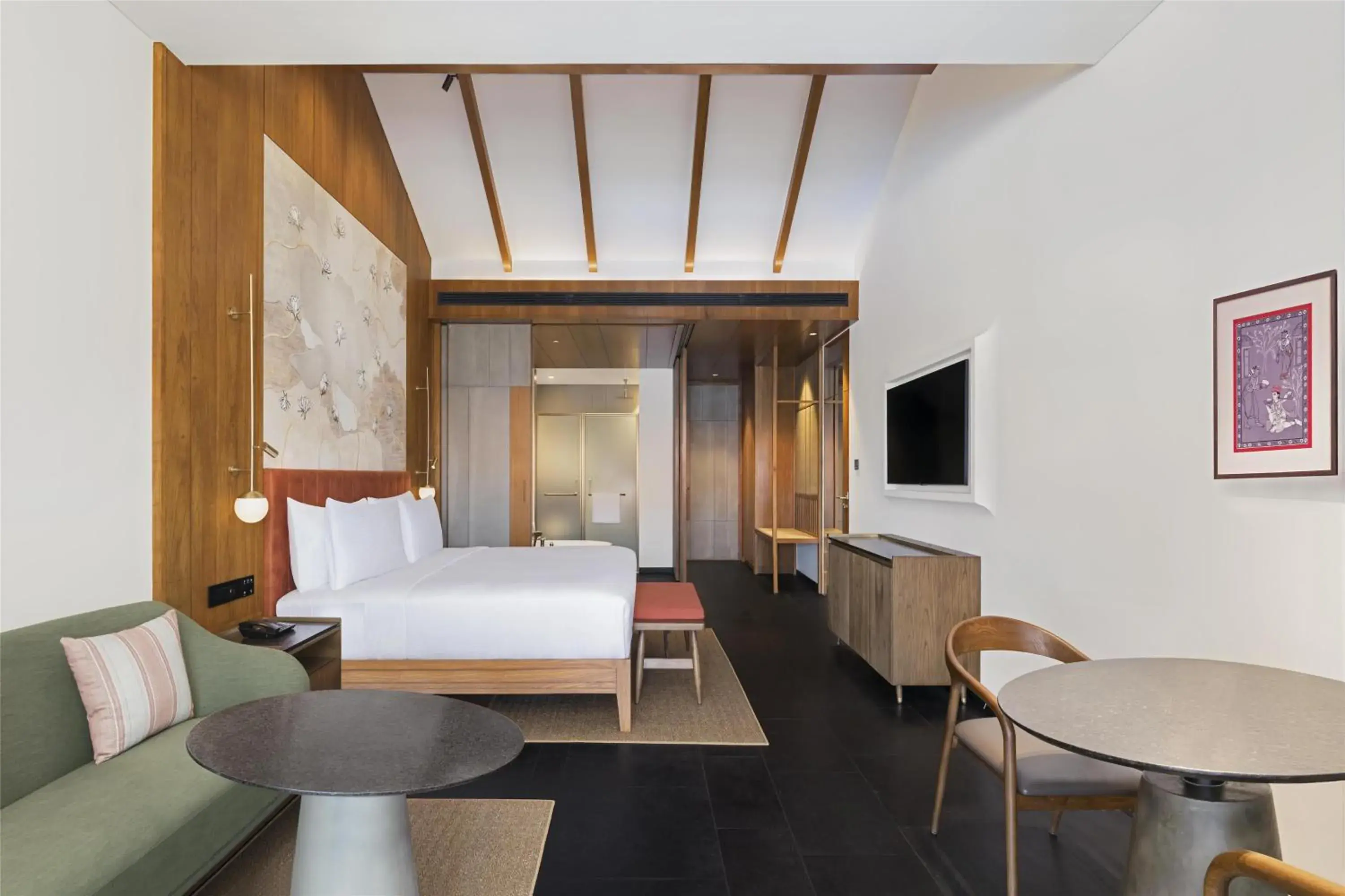 Deluxe King Room with Balcony and Garden View in Hilton Hyderabad Genome Valley Resort & Spa Deluxe King Room with Balcony and Garden View in Hilton Hyderabad Genome Valley Resort & Spa