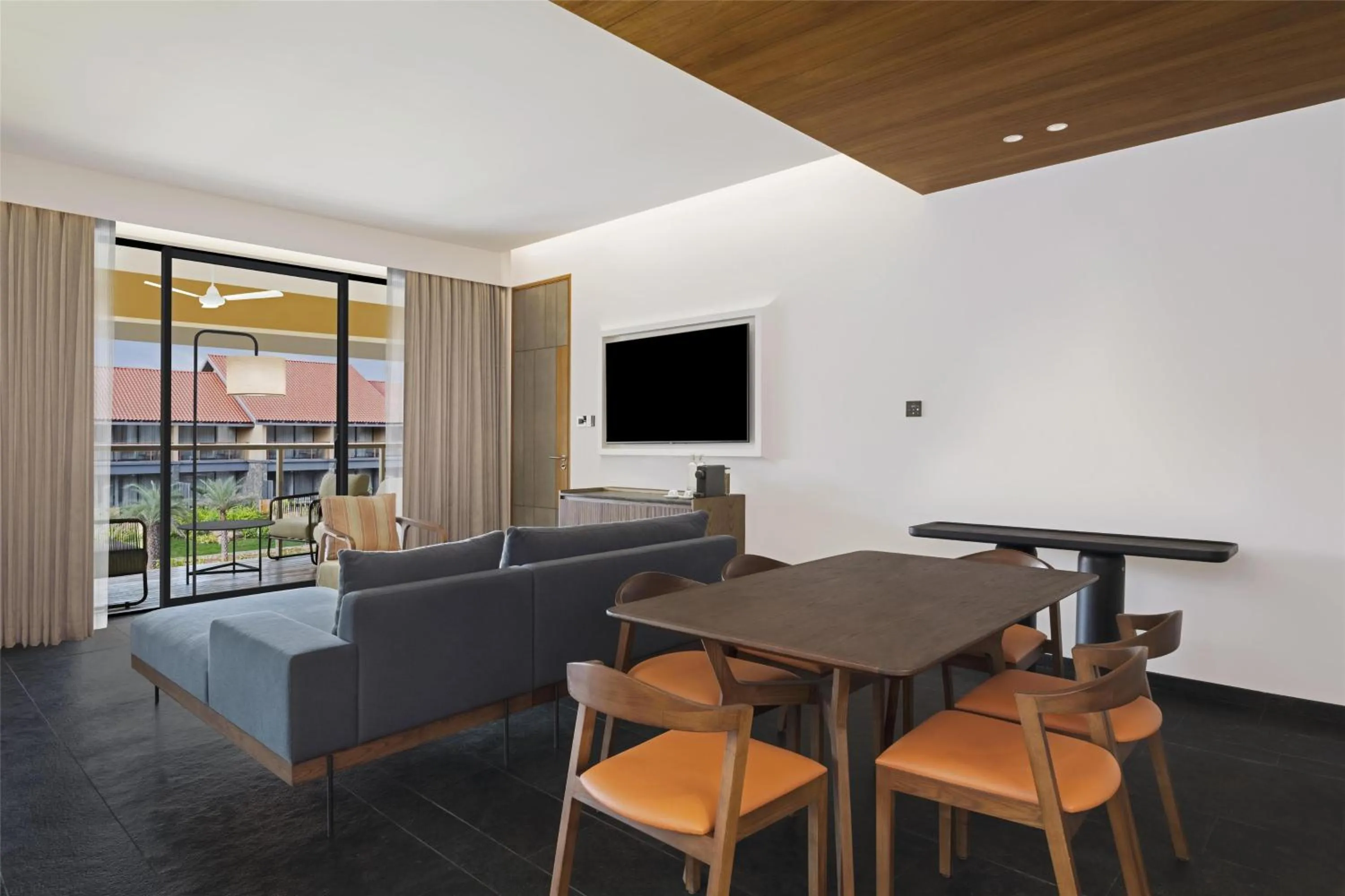 Living room in Hilton Hyderabad Genome Valley Resort & Spa