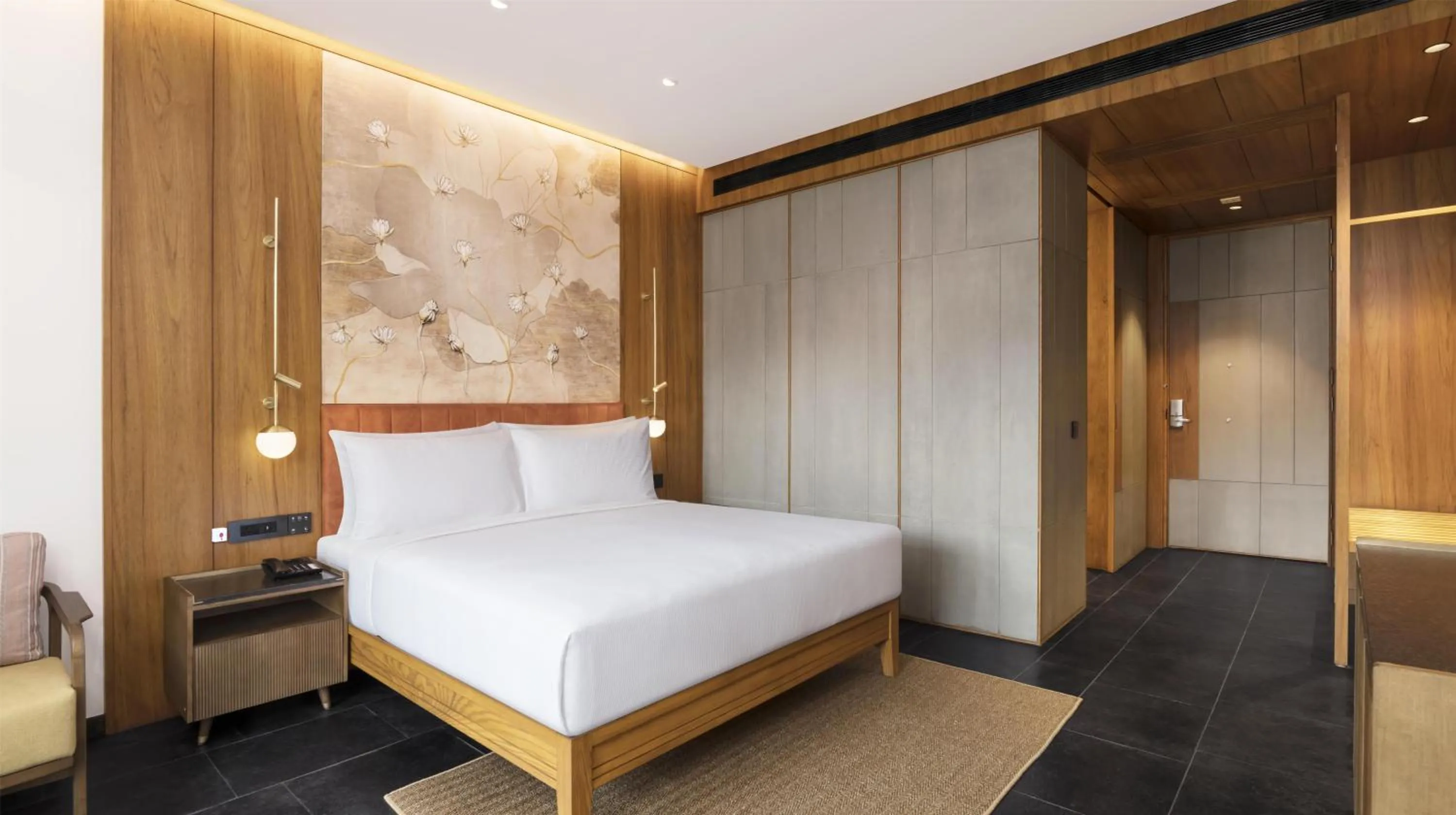 Bed in Hilton Hyderabad Genome Valley Resort & Spa