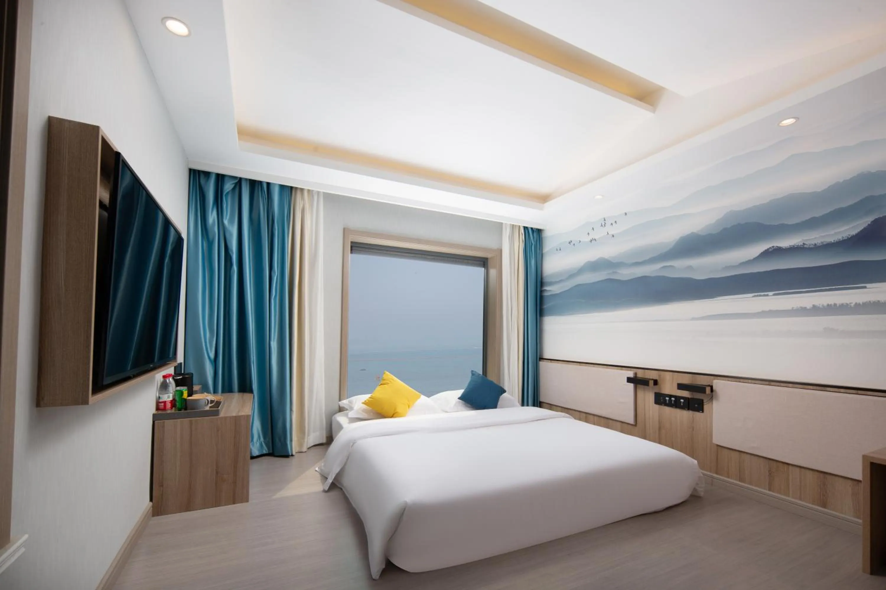 Bed in Floral Hotel Qingdao Dreamship Seaview Hotel