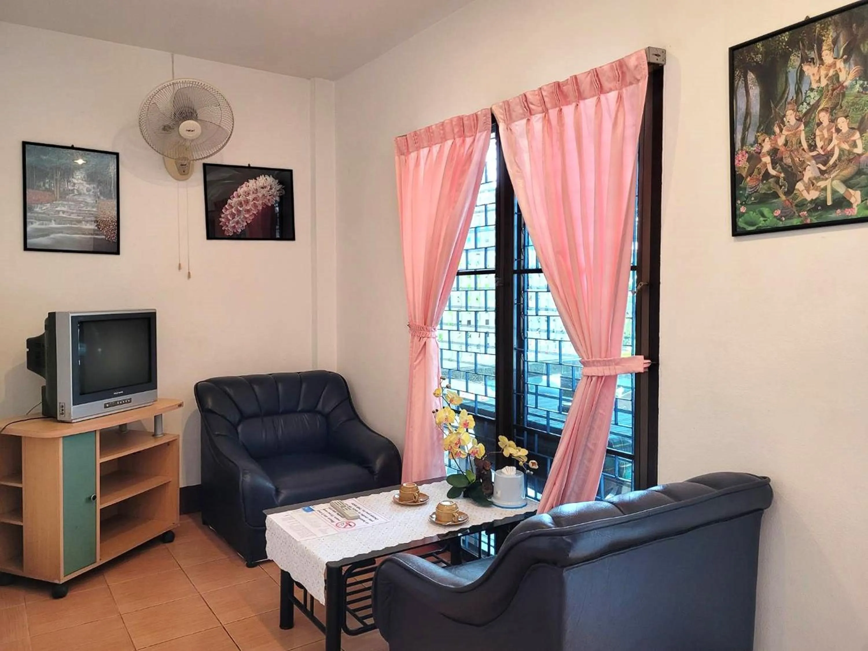 Living room in Rabbit Mansion Patong Hotel