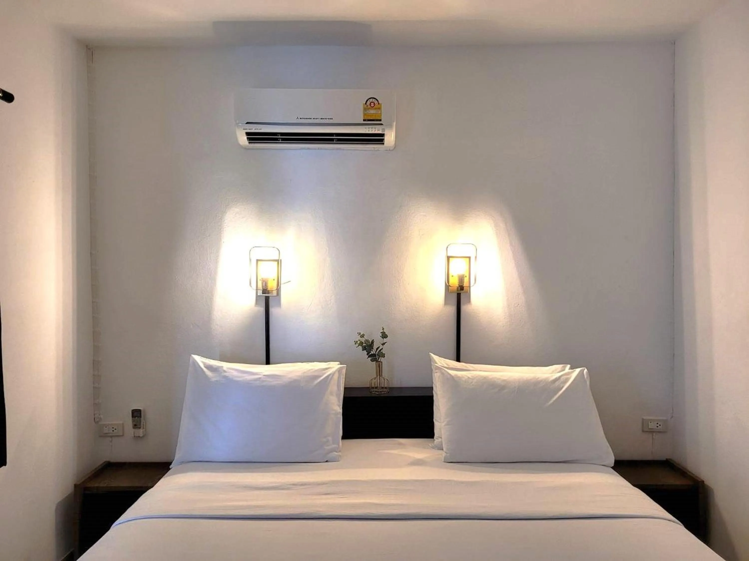 Bed in Rabbit Mansion Patong Hotel