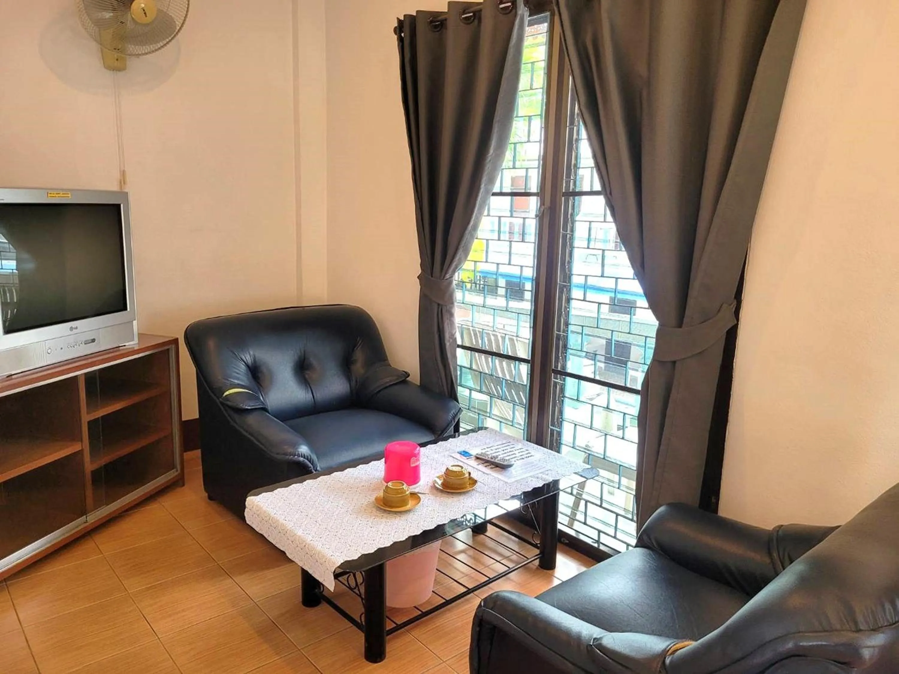 Living room in Rabbit Mansion Patong Hotel