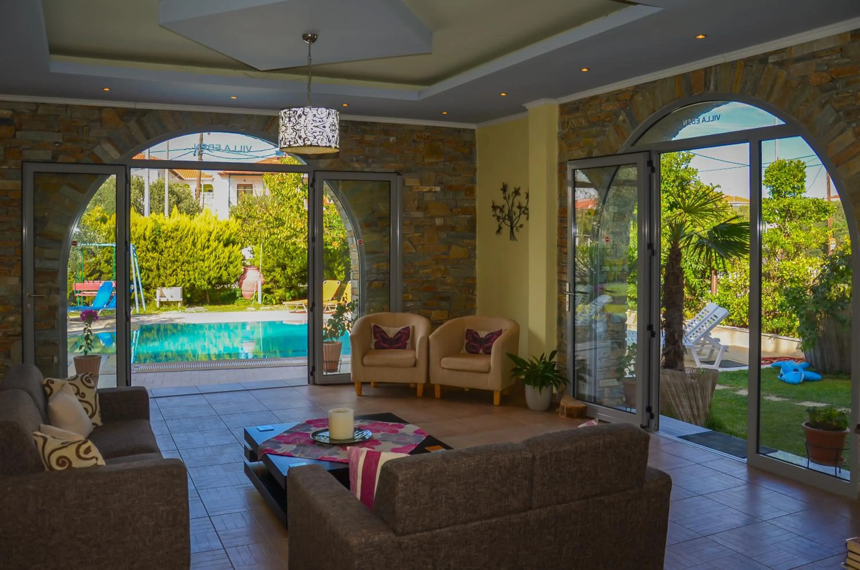 Communal lounge/ TV room in Villa Eden