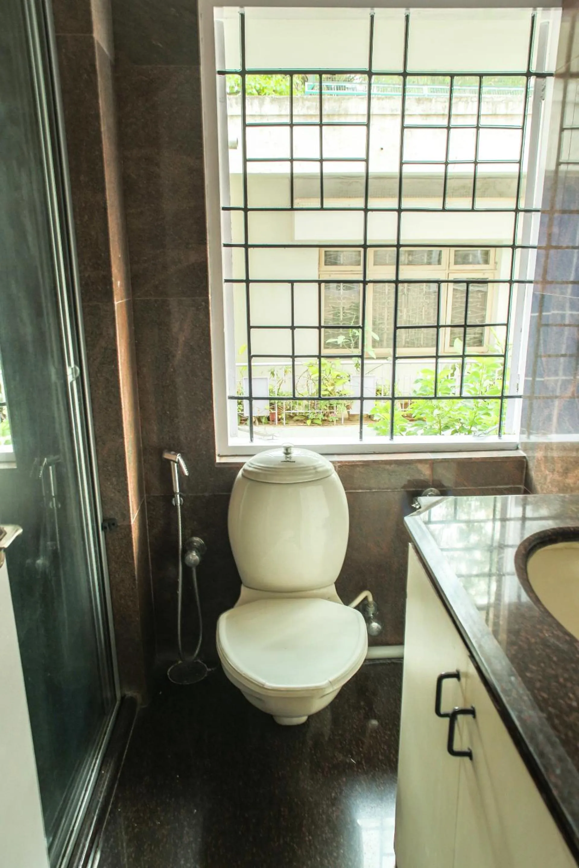Bathroom in Locul Uptown - Near Bangalore Palace Grounds