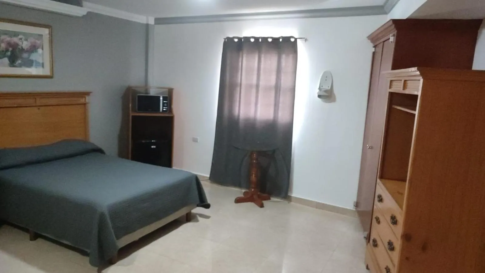Photo of the whole room, Bed in Hotel los coloniales de reynosa