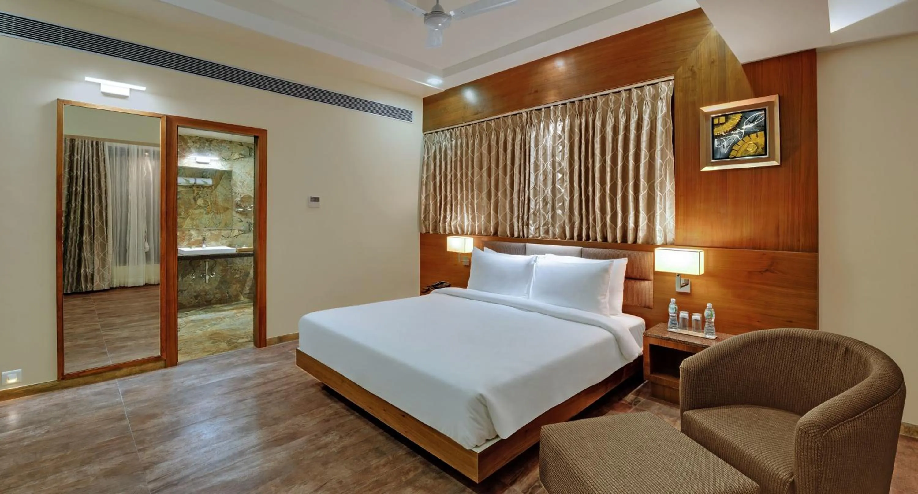 Bed in The Fern Residency Somnath