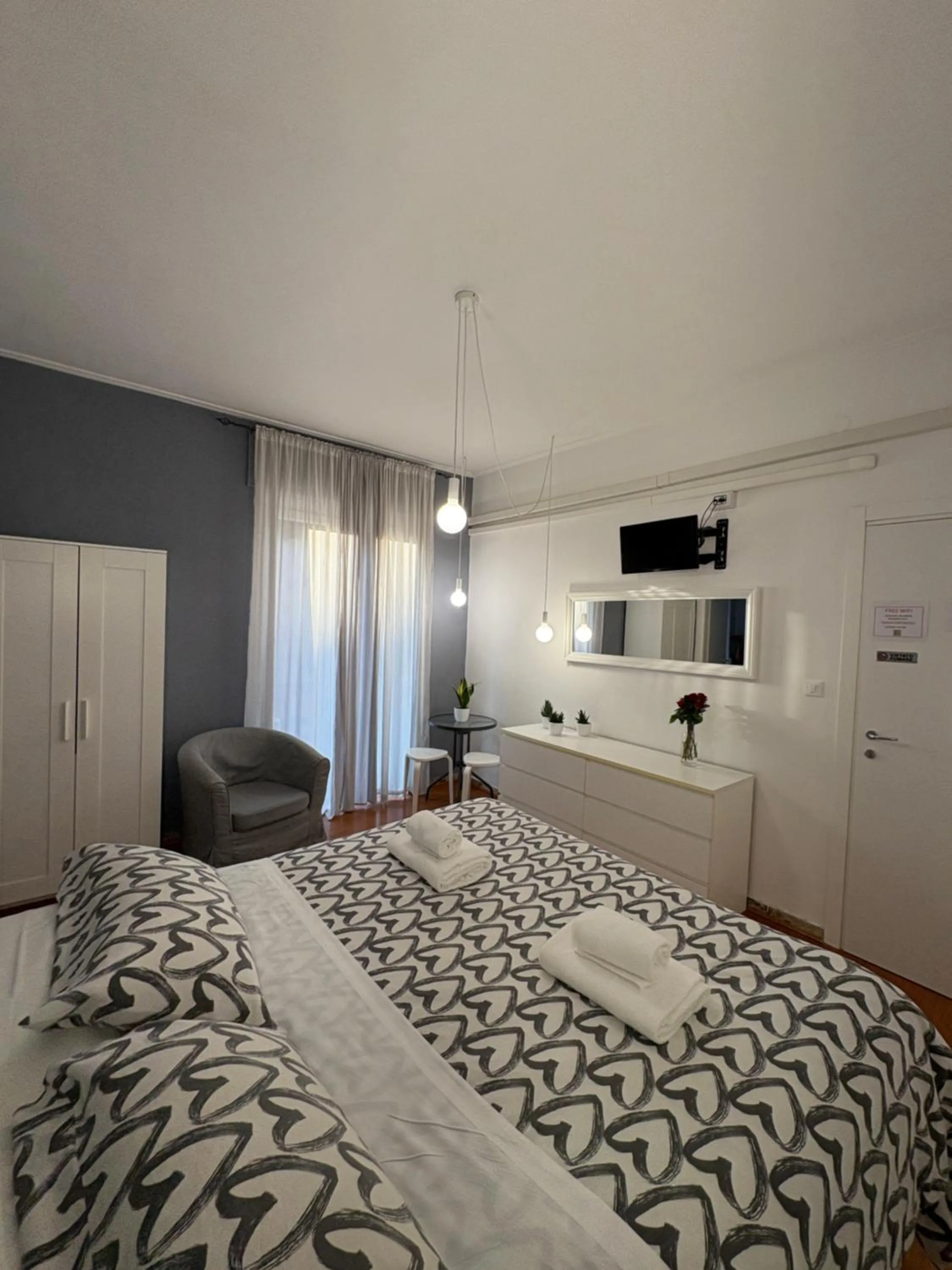 Bed in Delle Rose Rooms - Le Arche Verona