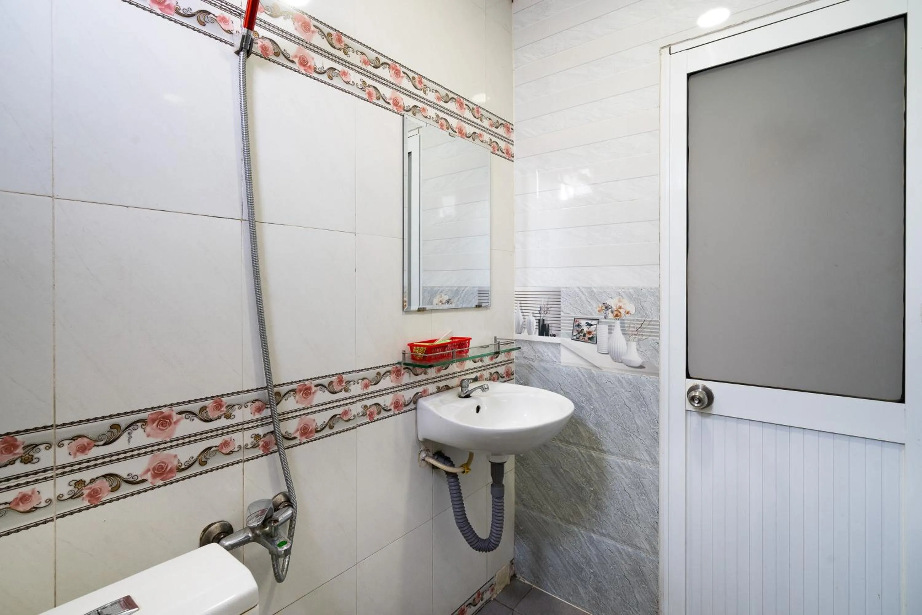 Bathroom in Collection O District 12 - Mau Tim Hotel