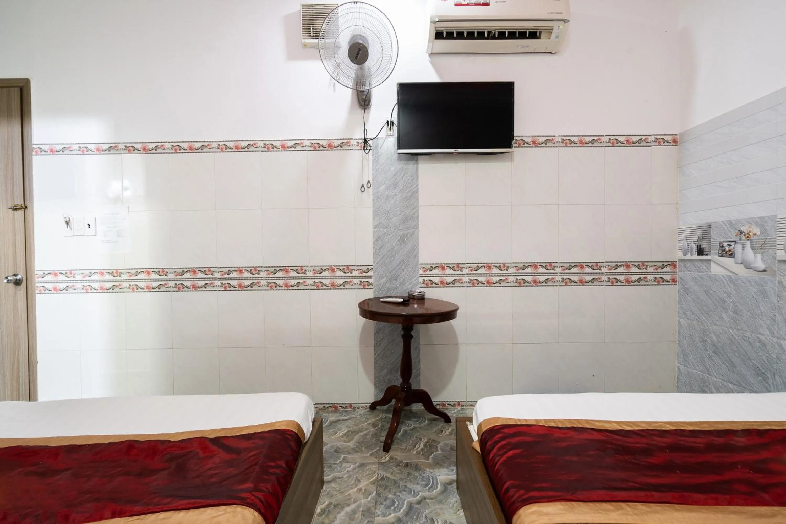 Superior Family Room in Collection O District 12 - Mau Tim Hotel