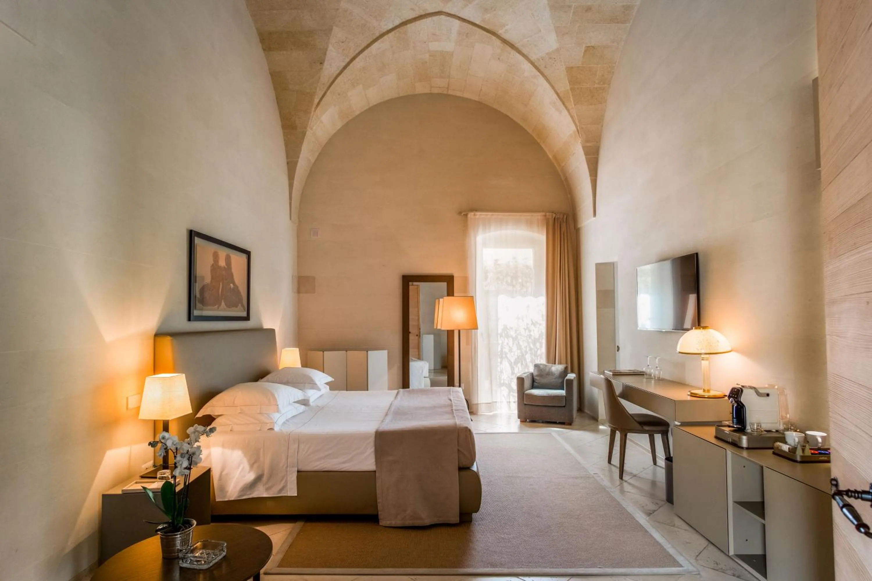 Bed in La Fiermontina Luxury Home Hotel