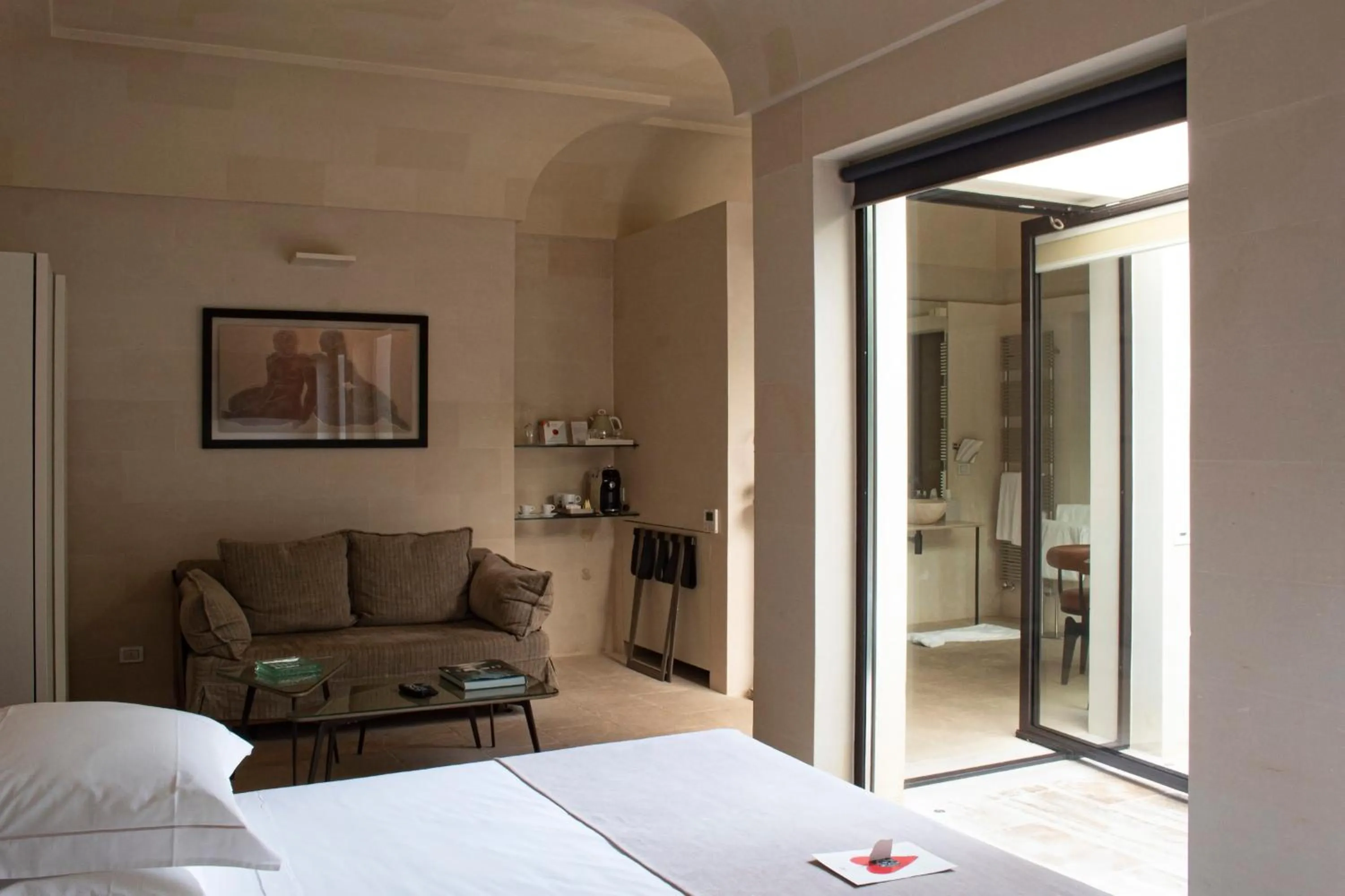 Bed in La Fiermontina Luxury Home Hotel