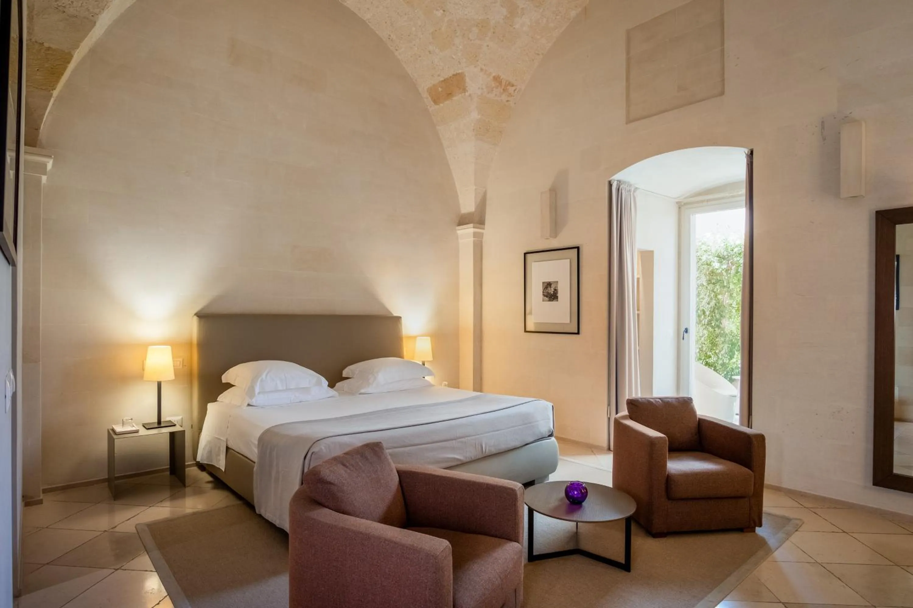 Bed in La Fiermontina Luxury Home Hotel