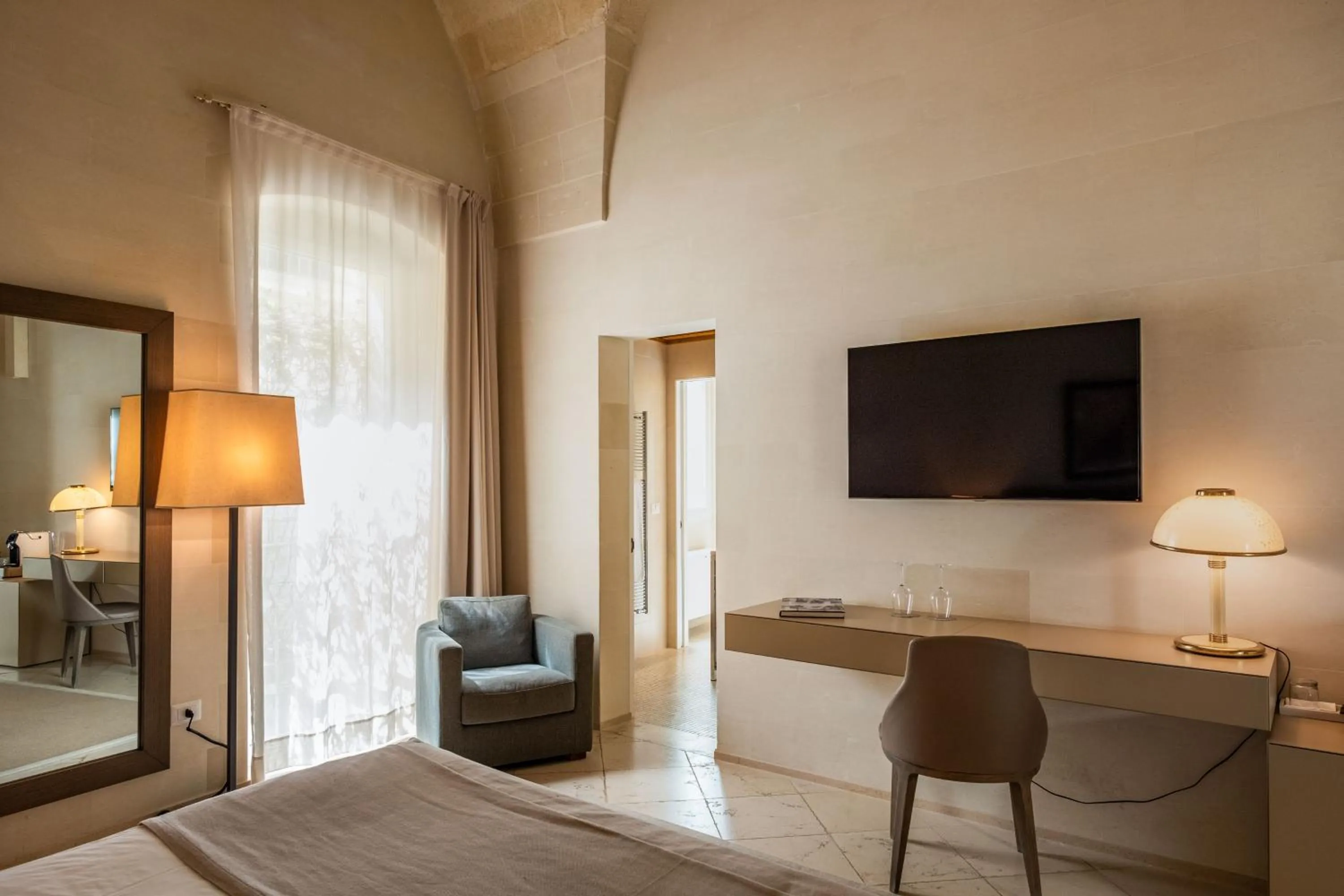 Bed in La Fiermontina Luxury Home Hotel