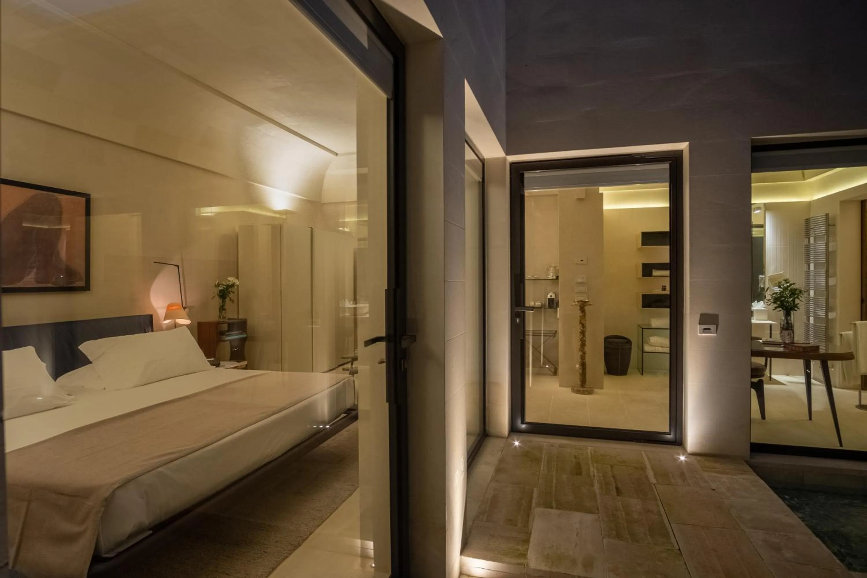 Bed in La Fiermontina Luxury Home Hotel